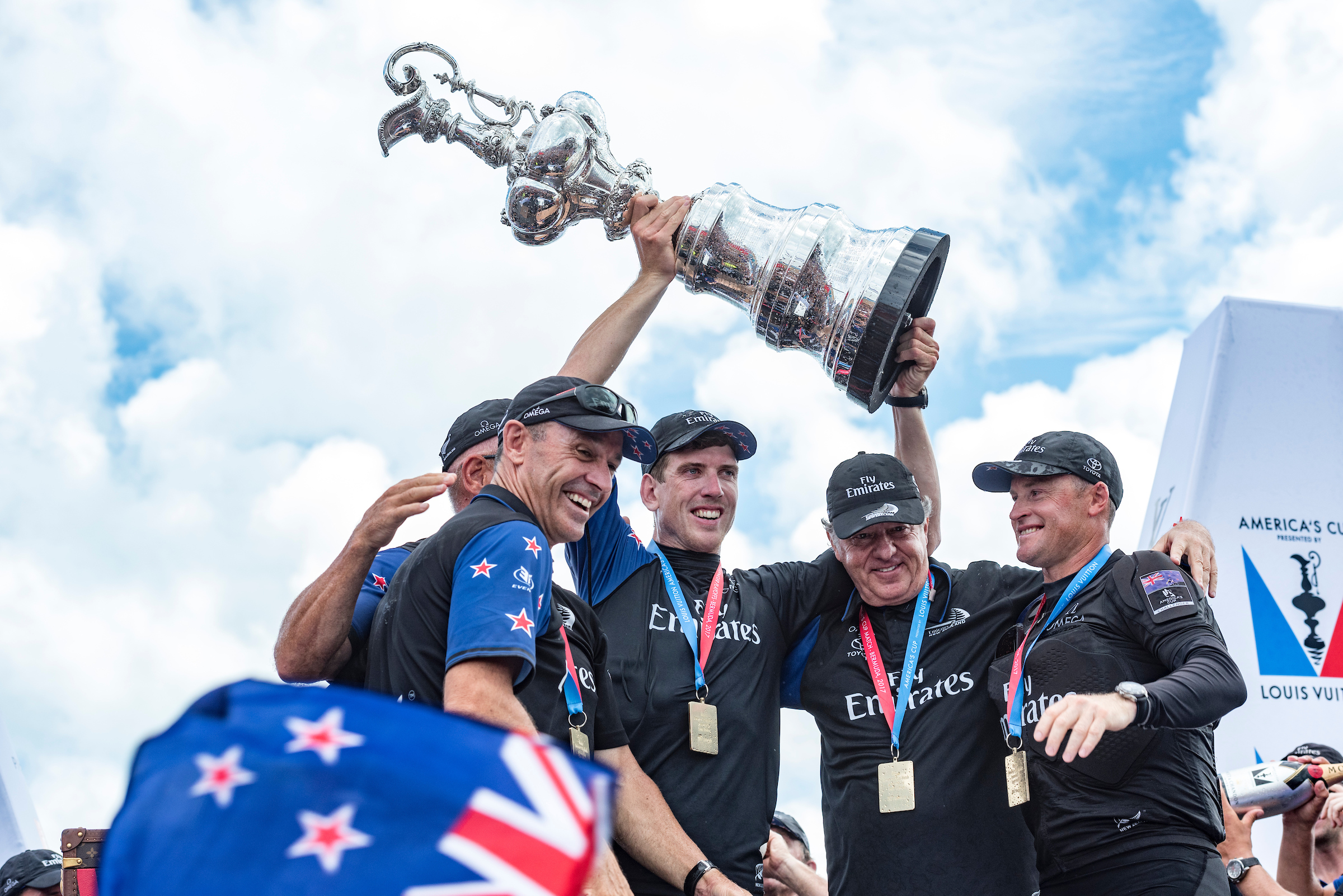 Team New Zealand bosses Kevin Shoebridge, Grant Dalton, Peter Burling, Matteo de Nora and Glenn Ashby celebrate winning the America's Cup. Photo / Photosport
