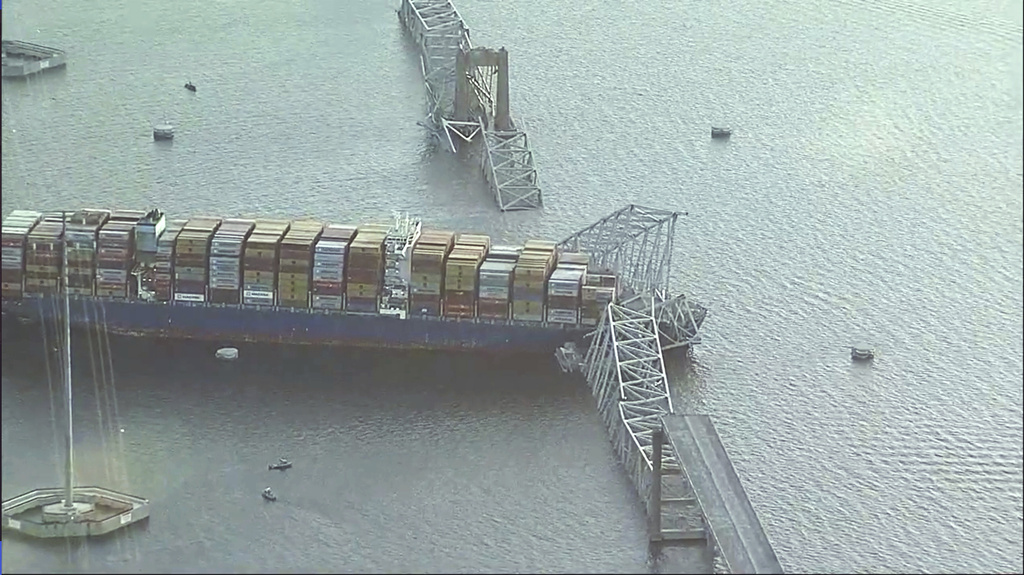 Parts of the Francis Scott Key Bridge remain after a container ship collided with a support Tuesday, March 26, 2024 in Baltimore. The major bridge in Baltimore snapped and collapsed after a container ship rammed into it early Tuesday, and several vehicles fell into the river below. Photo / AP