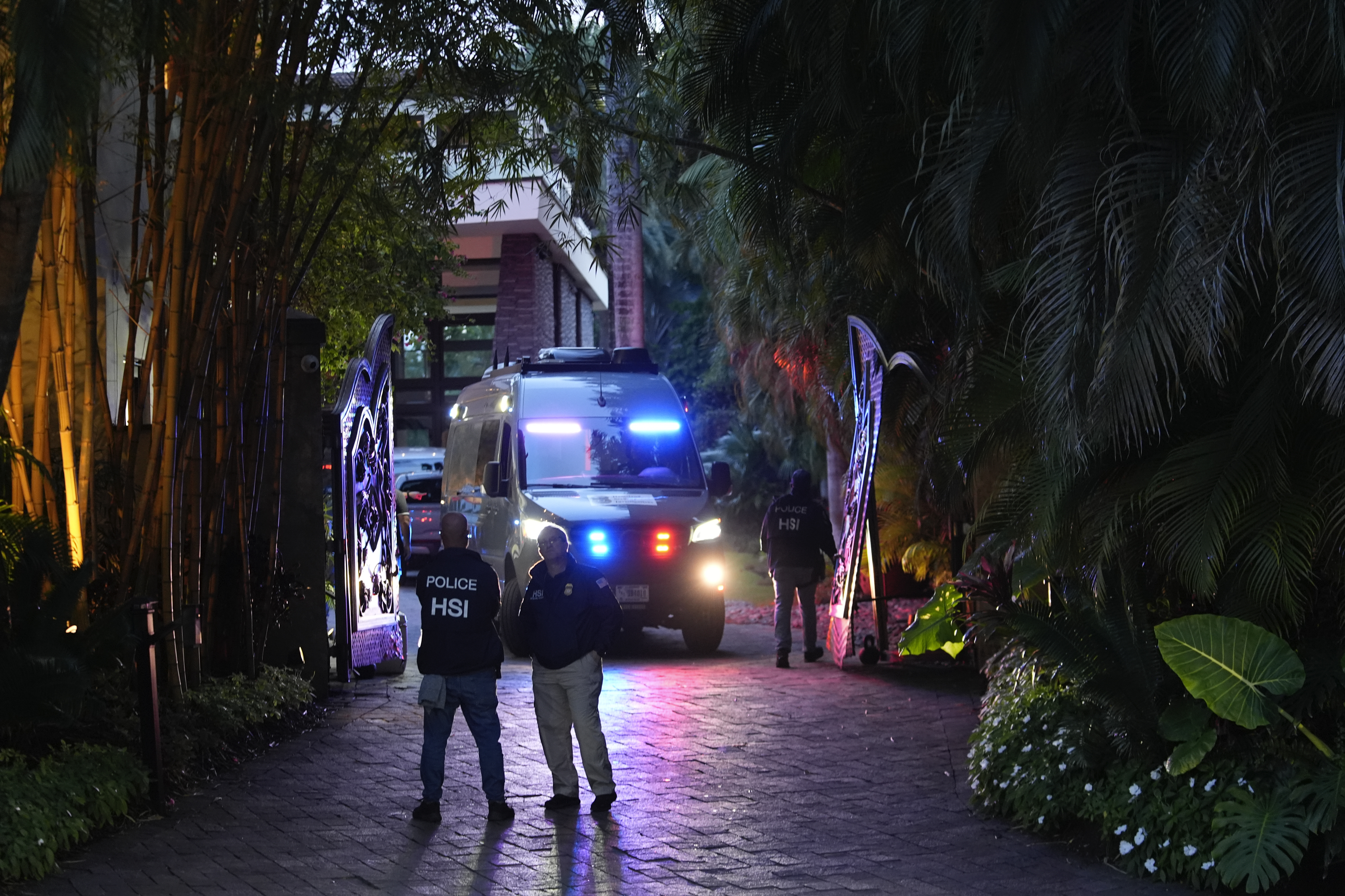 The raid comes amid allegations of assault and human trafficking. Photo / AP