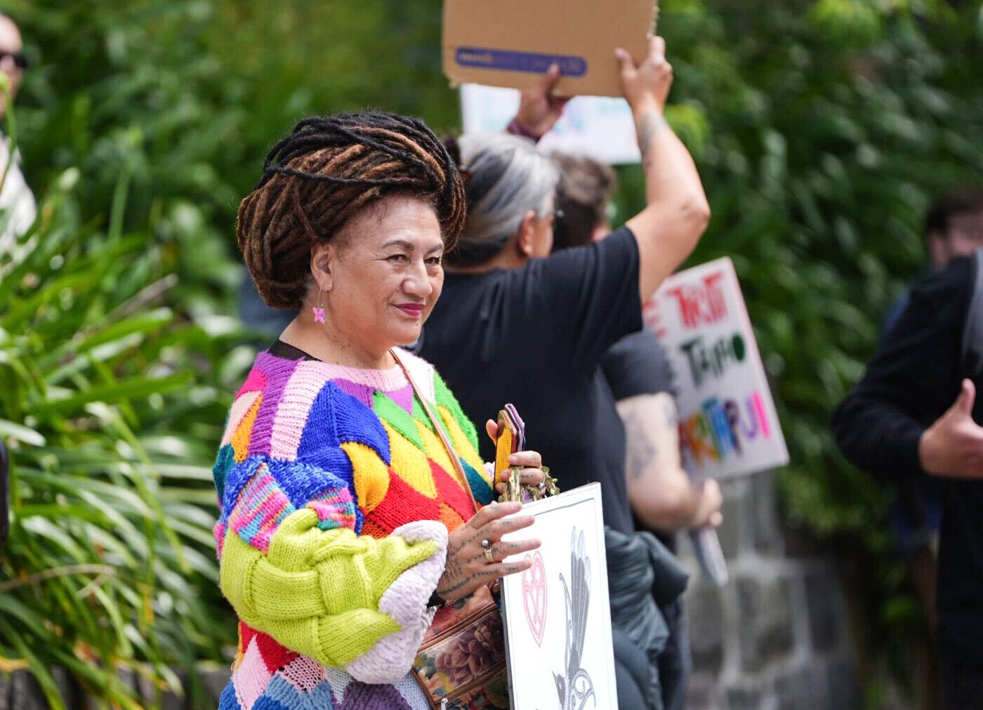 People outside the Act offices in Epsom protesting against the introduction of the Treaty Principles Bill in Parliament later today. Photo / Carson Bluck
