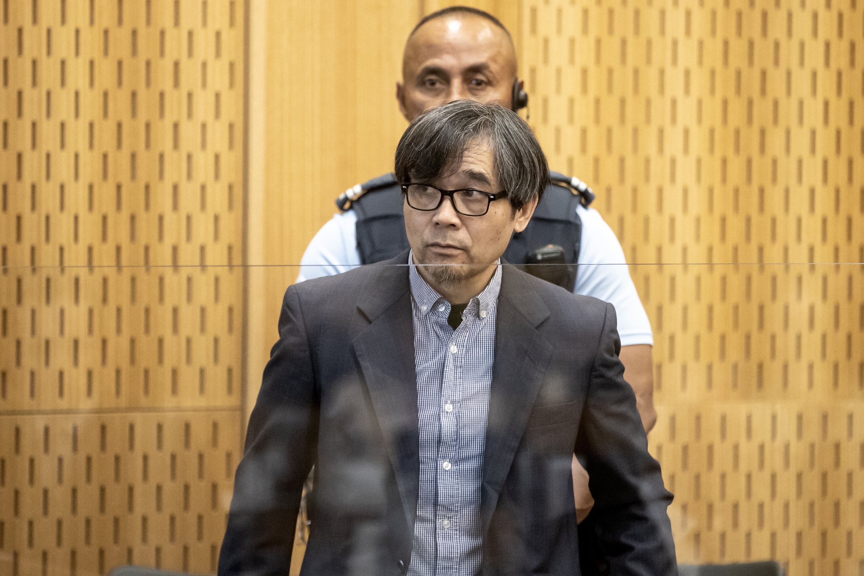 Yanfei Bao's killer Tingjun Cao in court. Photo / Pool