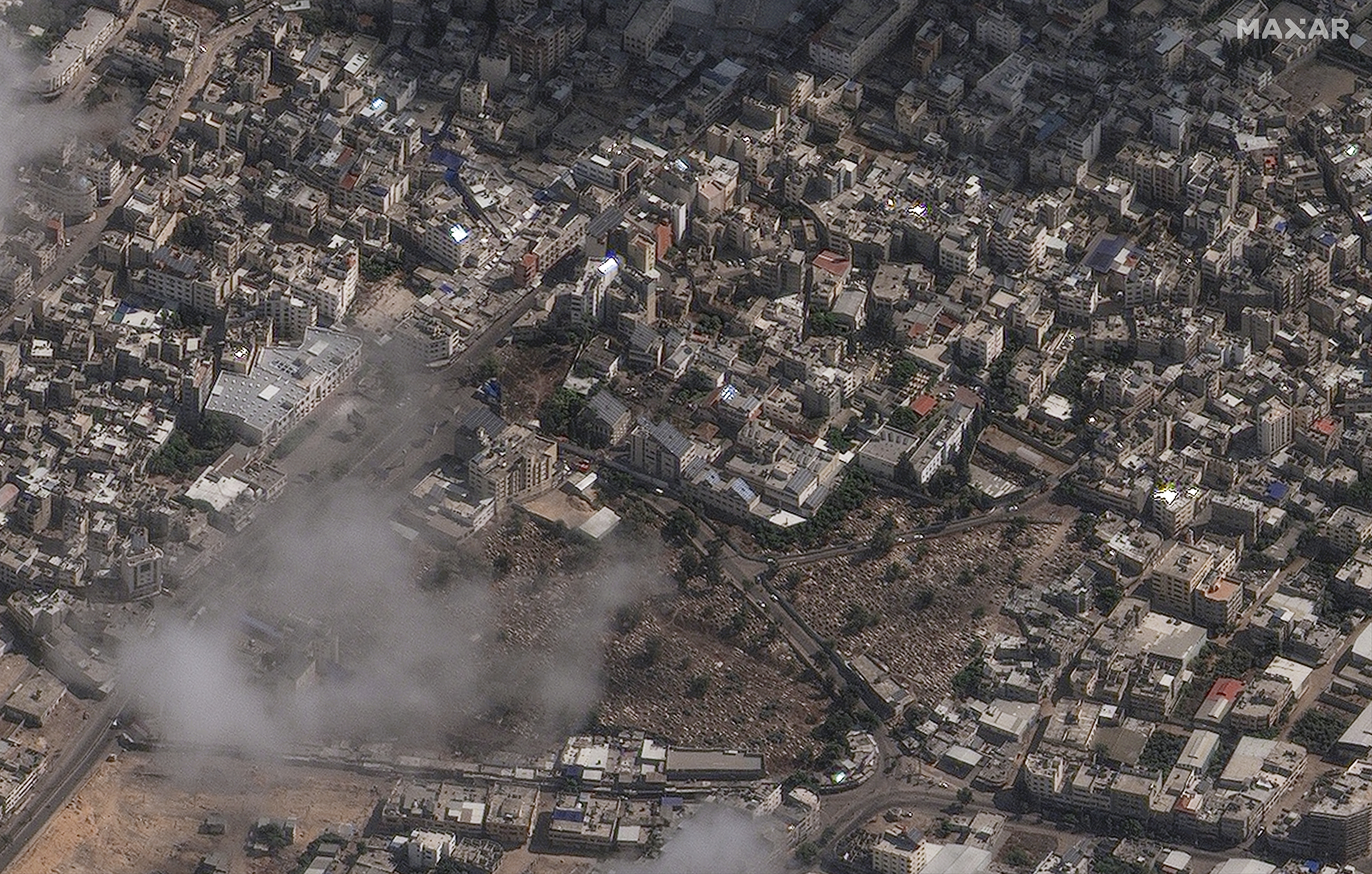 This image provided by Maxar Technologies on Wednesday, Oct. 18, 2023 shows an overview of al-Ahli Hospital after explosion in Gaza City.  (Satellite image ©2023 Maxar Technologies via AP)