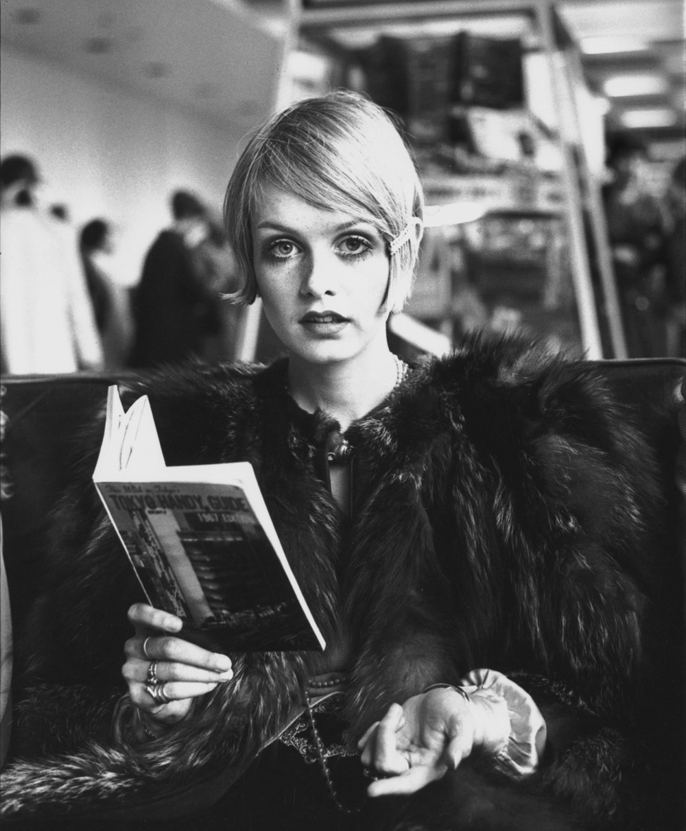 Iconic British model Twiggy reading at London Airport, 1967. Photo / Jim Gray, Getty Images.