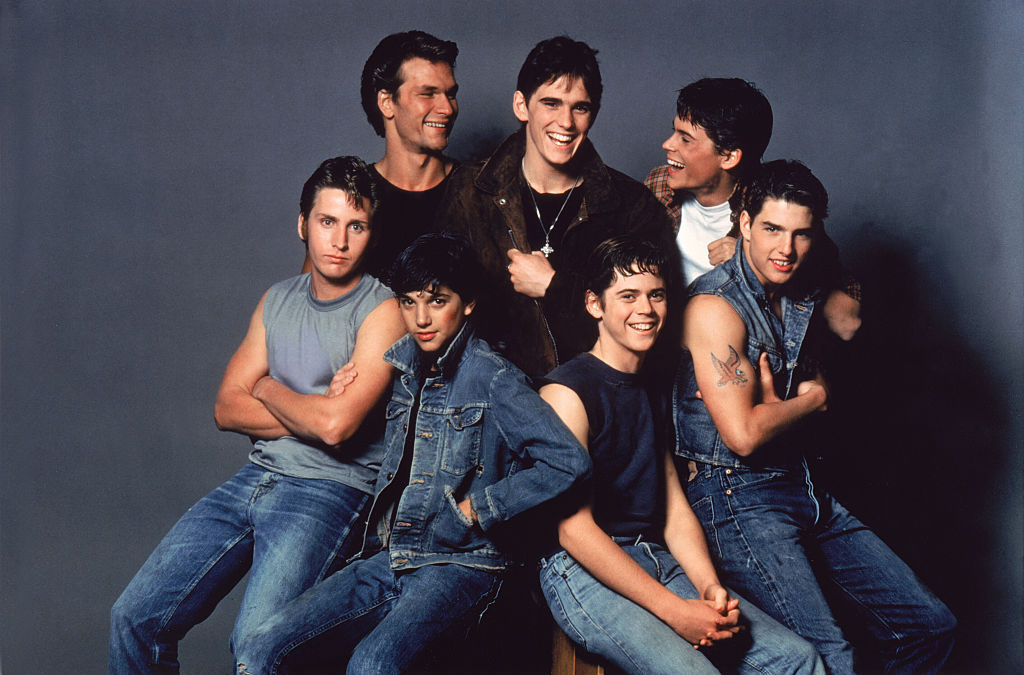 Patrick Swayze, Matt Dillon, Rob Lowe, Emilio Estevez, Ralph Macchio, Thomas C. Howell, and Tom Cruise on the set of The Outsiders. Photo / Getty Images