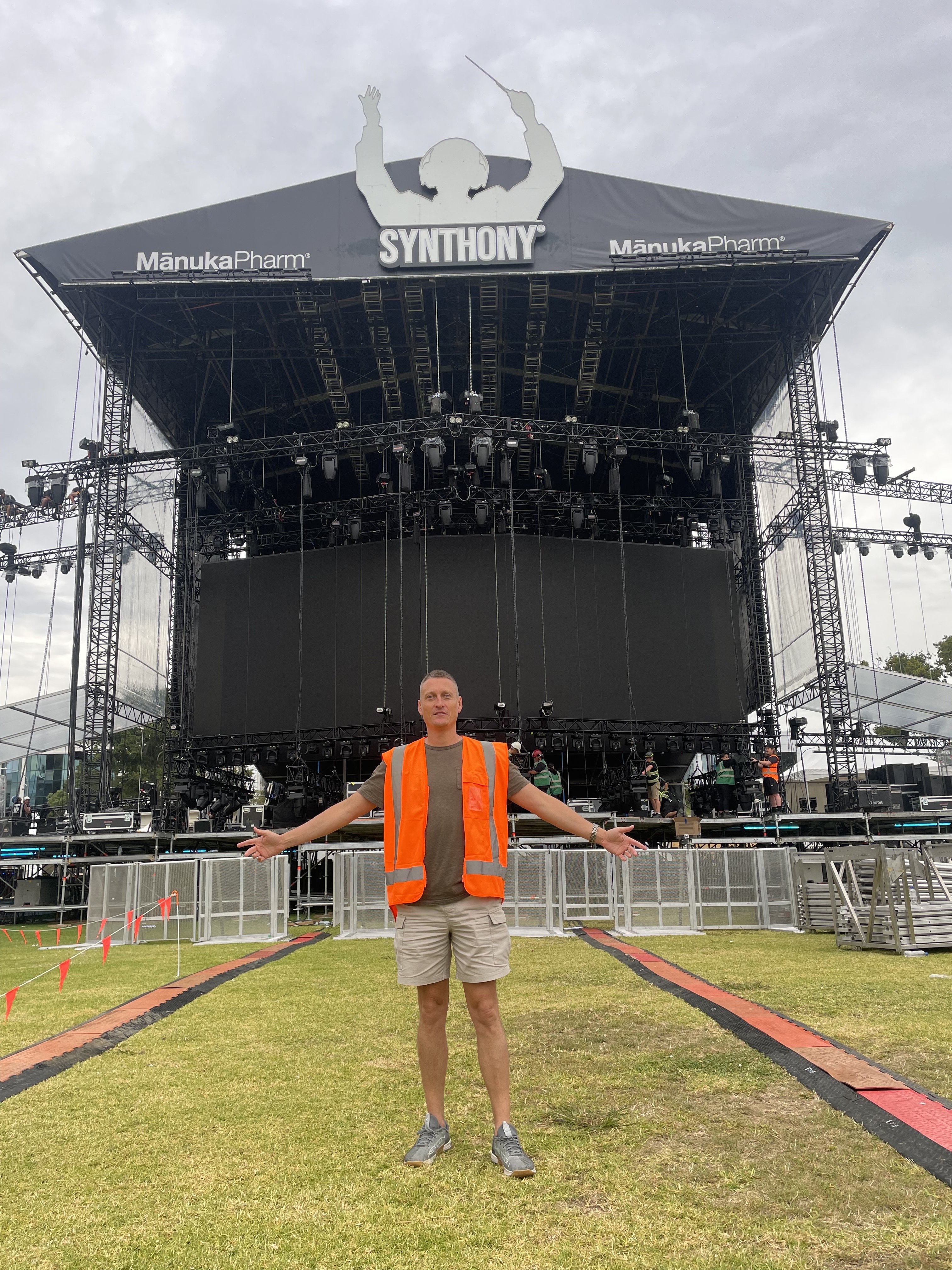 Duco Events boss David Higgins in front of the towering Synthony stage in Auckland Domain in 2024.