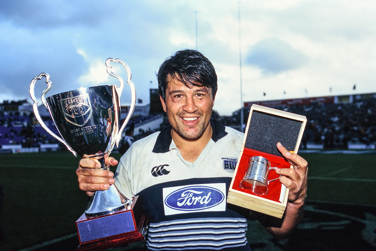 Blues captain Zinzan Brooke with the Super 12 trophy after the competition's first final in 1996. Photo / Photosport