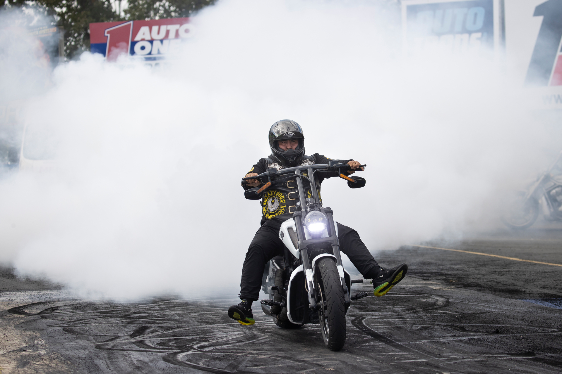 Members of the Greazy Dogs motorcycle gang do burnouts before they race at Meremere Dragway. The race day was organised by the Greazy Dogs. Photo / Brett Phibbs