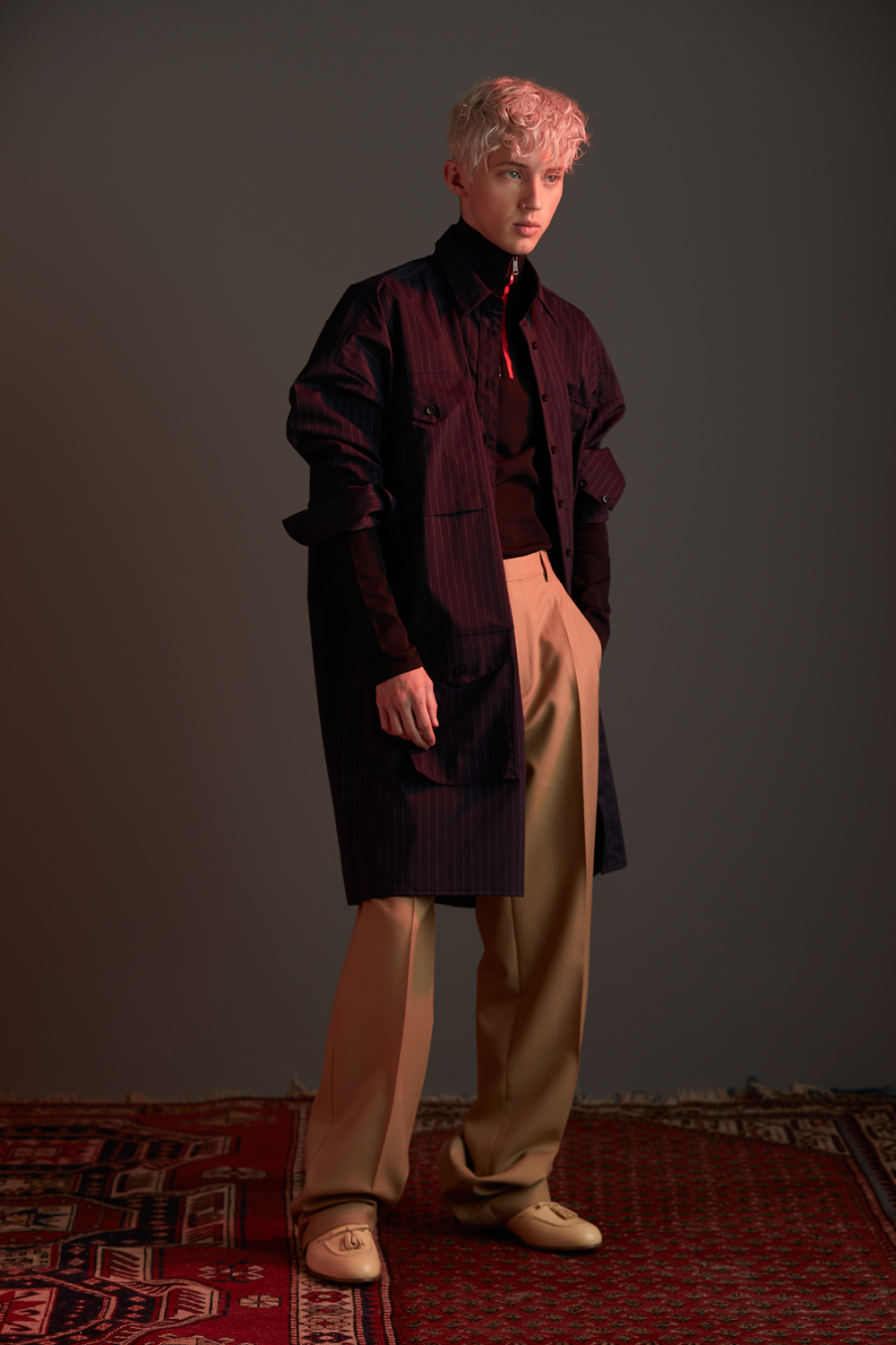 Jimmy D shirt $220. Prada skivvy $1490. Gucci trousers $980 and loafers $1300. Photo / Mara Sommer.