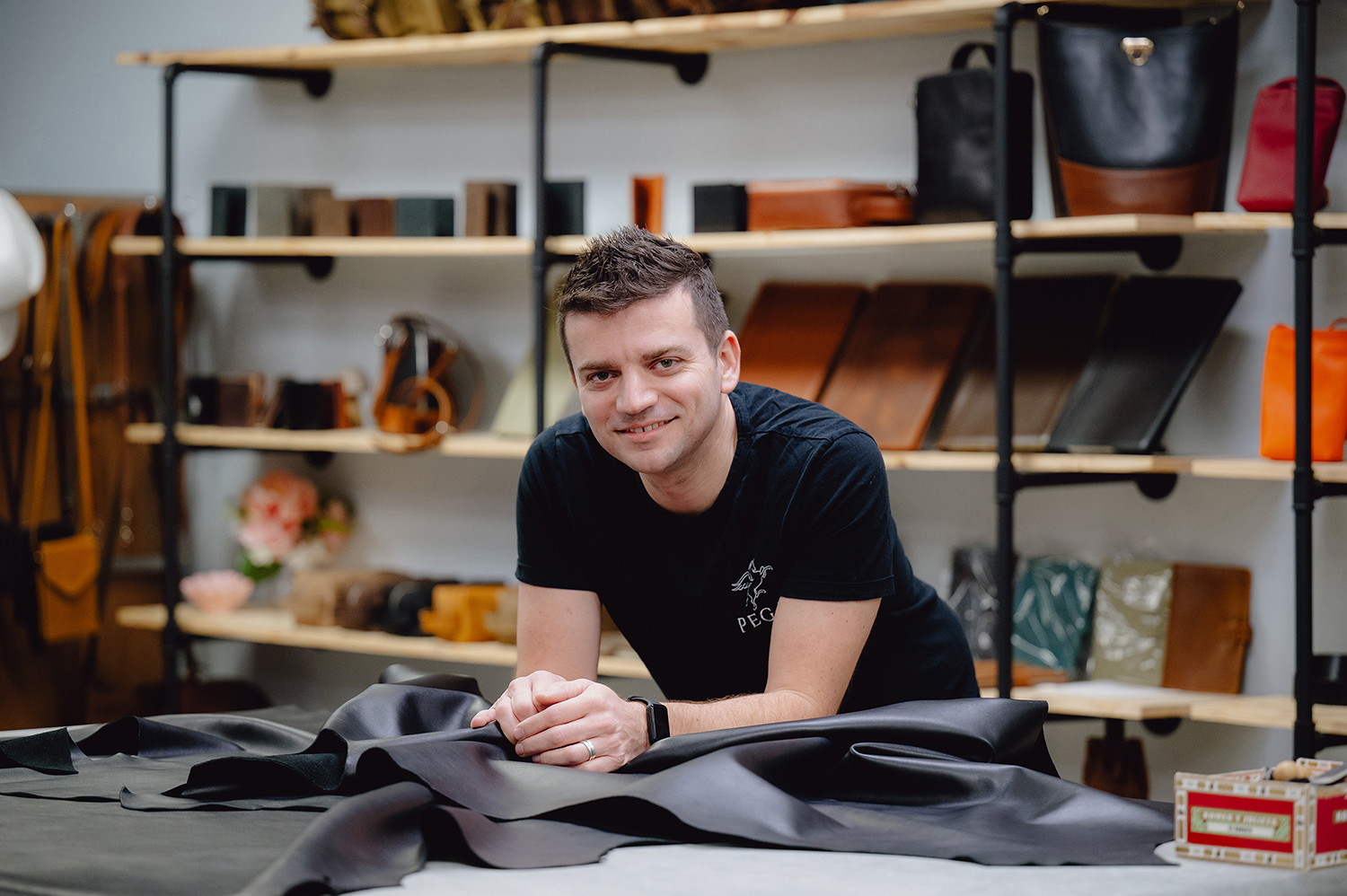 Volkan Yilmaz, known as Tanner Leatherstein, at Pegai, his leather store in Dallas. Photo / Desiree Rios, The New York Times