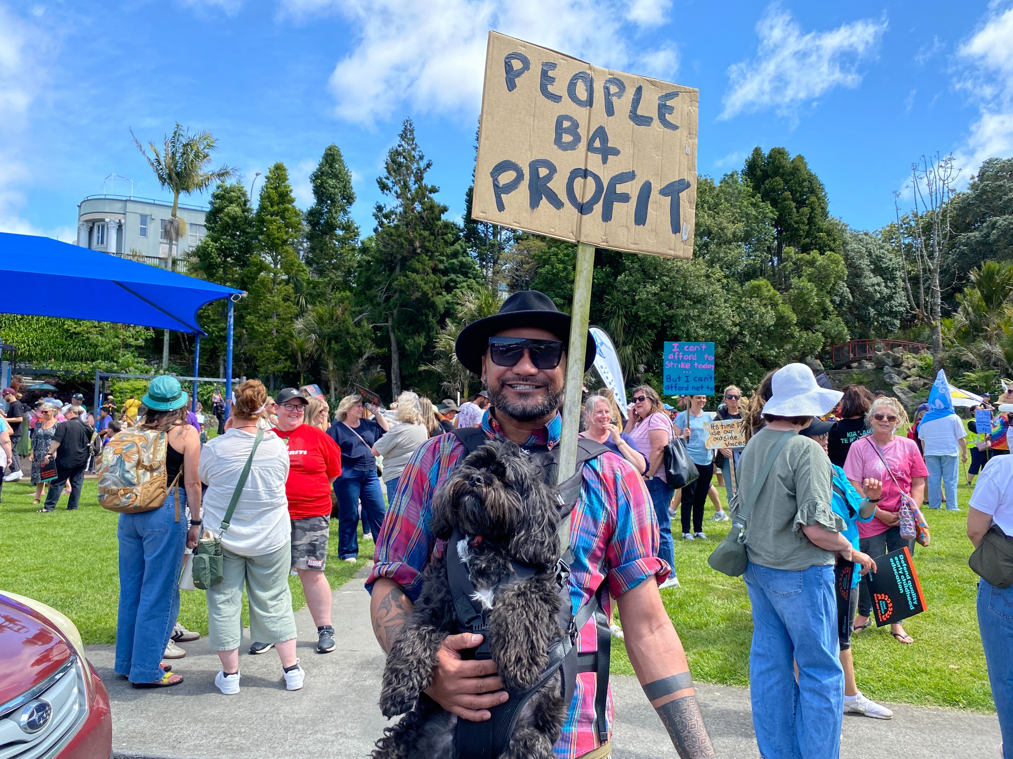 Sydney Heremaia at the Whangārei strike with dog, Oscar. Photo / Denise Piper