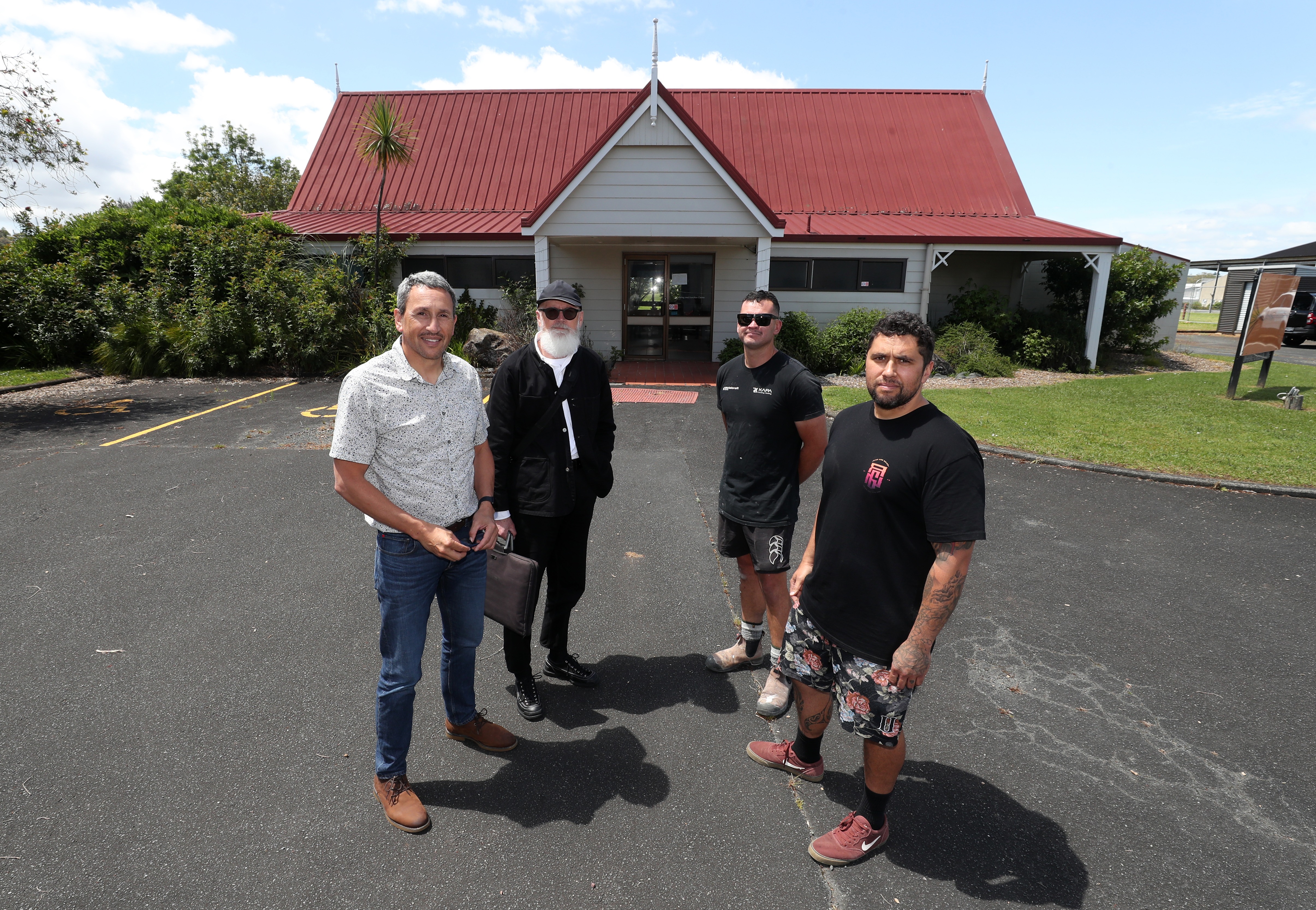 Hihiaua Cultural Centre’s team, including (from left) chairman Ryan Welsh, architect Craig Moller, builder Rua Kapa from Kapa Building & Roofing, and resident carver Poutama Hetaraka,  are looking forward to stage two coming to life, starting with a complete revamp of the former A’Fare building. Photo / Michael Cunningham