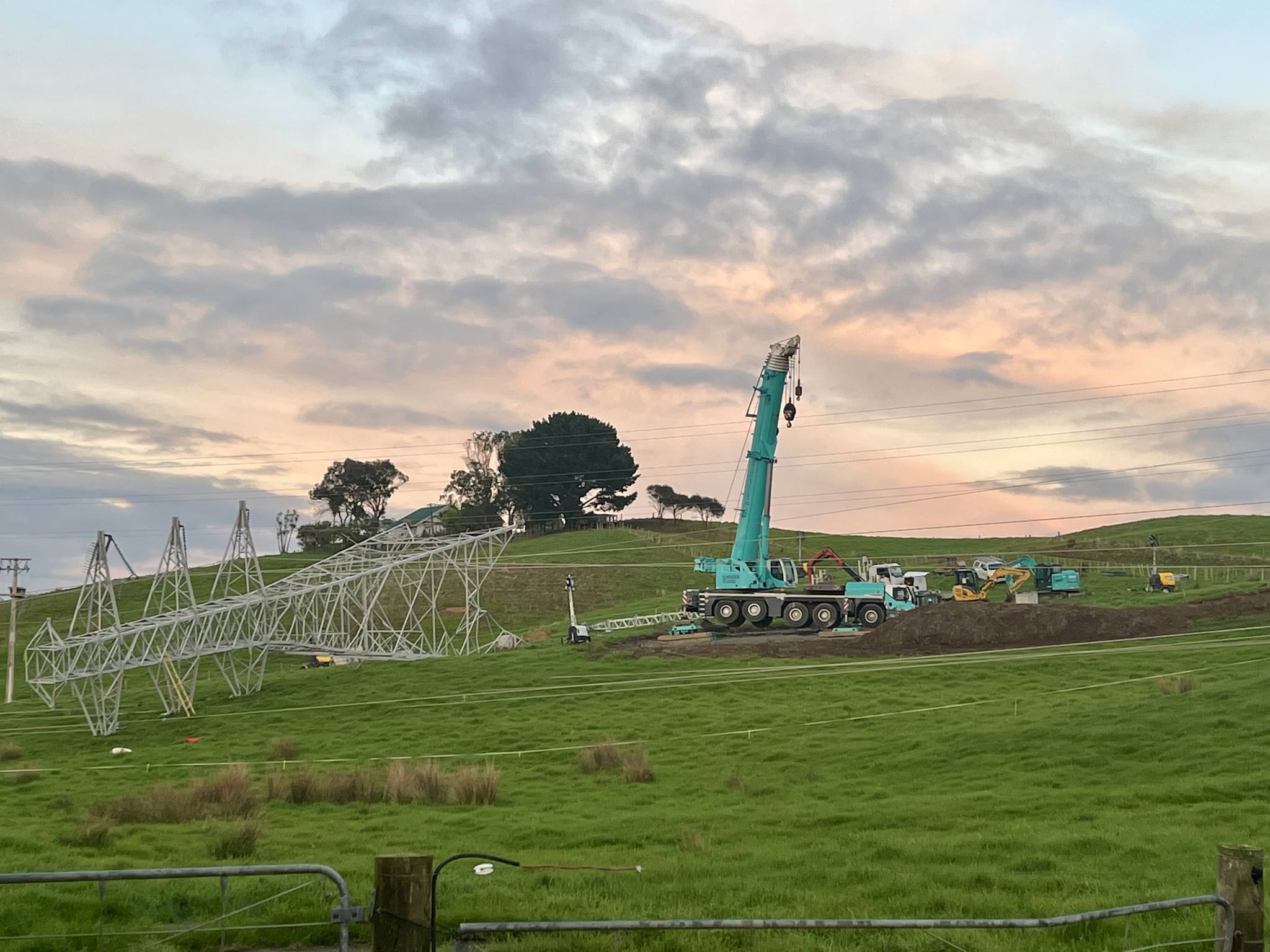 Transpower staff prepare to install a temporary tower for part transfer of the electricity supply into Northland following the collapse of the pylon near Glorit. Photo / Transpower