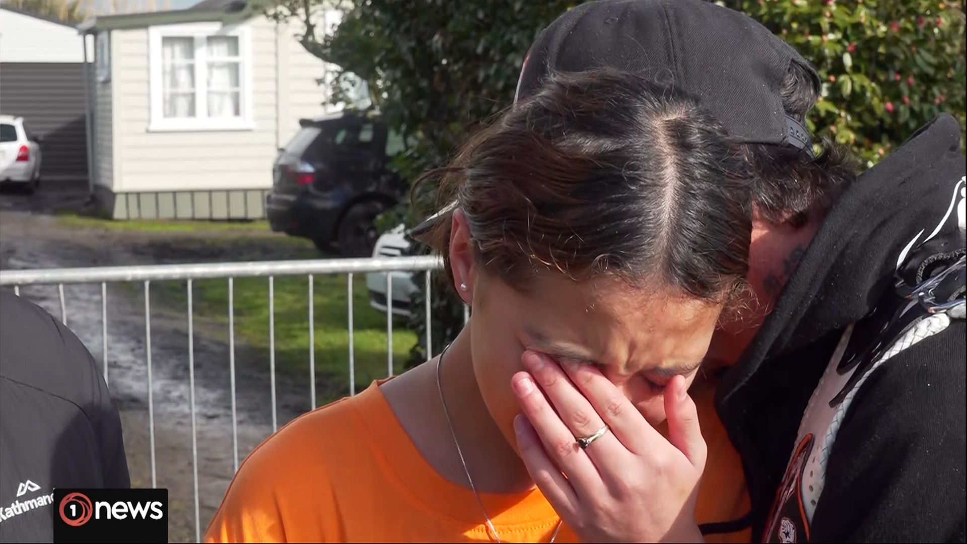 Jo Sione-Lauaki's daughter Harmoney Sione Lauaki, 14, appearing on 1News at 6pm, is brought to tears talking about her mum outside the family home in Dargavile. Photo / 1News