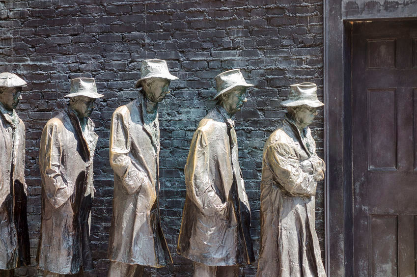 An art installation at the Franklin Delano Roosevelt Memorial in Washington DC in 2014 shows a bread line of five men waiting at a door to commemorate the Great Depression of the 1930s.