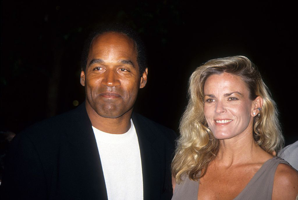 OJ Simpson and Nicole Brown. Simpson's former manager claims the NFL star 
