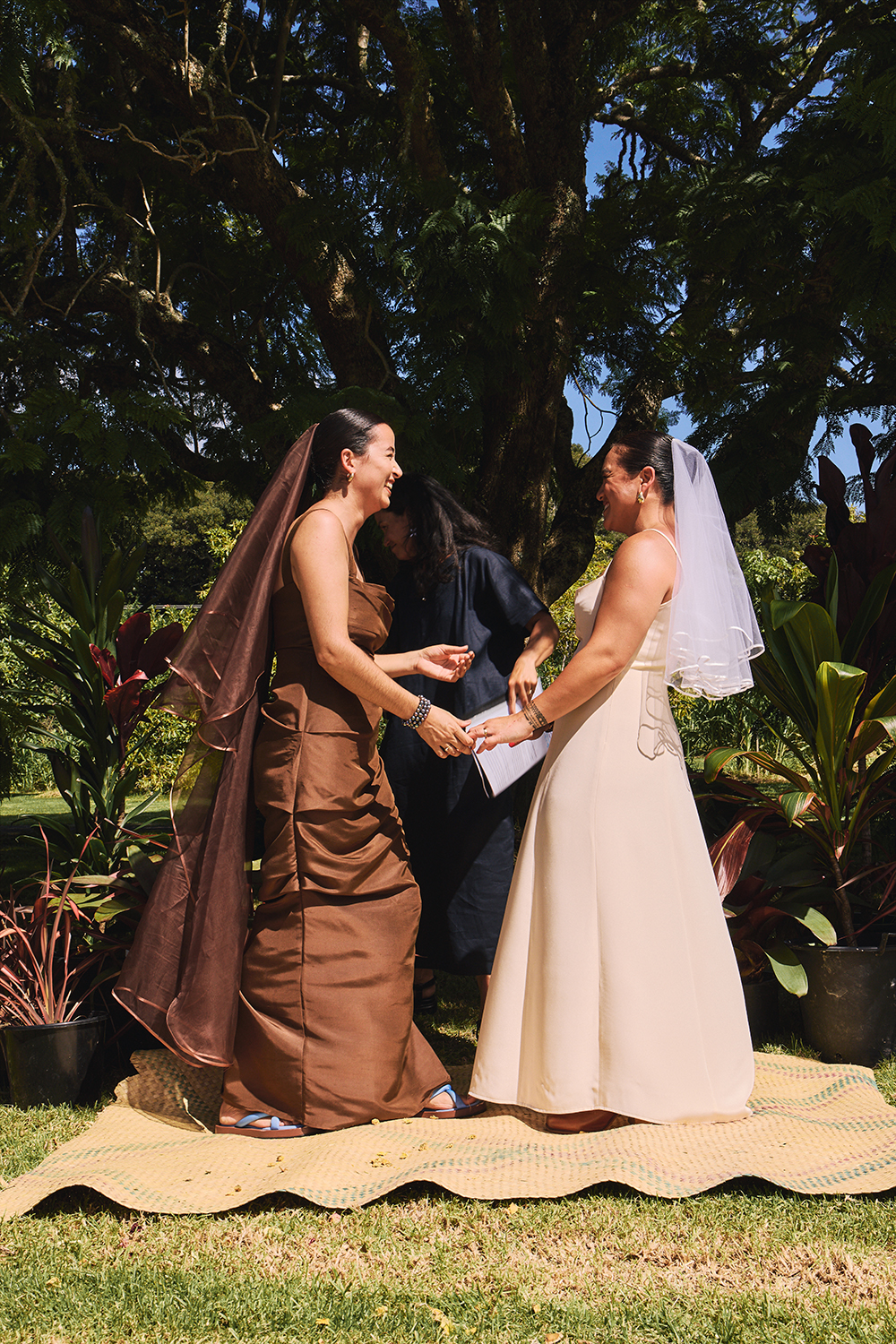 Keva and Deirdre were married under a jacaranda tree at the Rands family orchard in Glenbervie. Photo / Apela Bell
