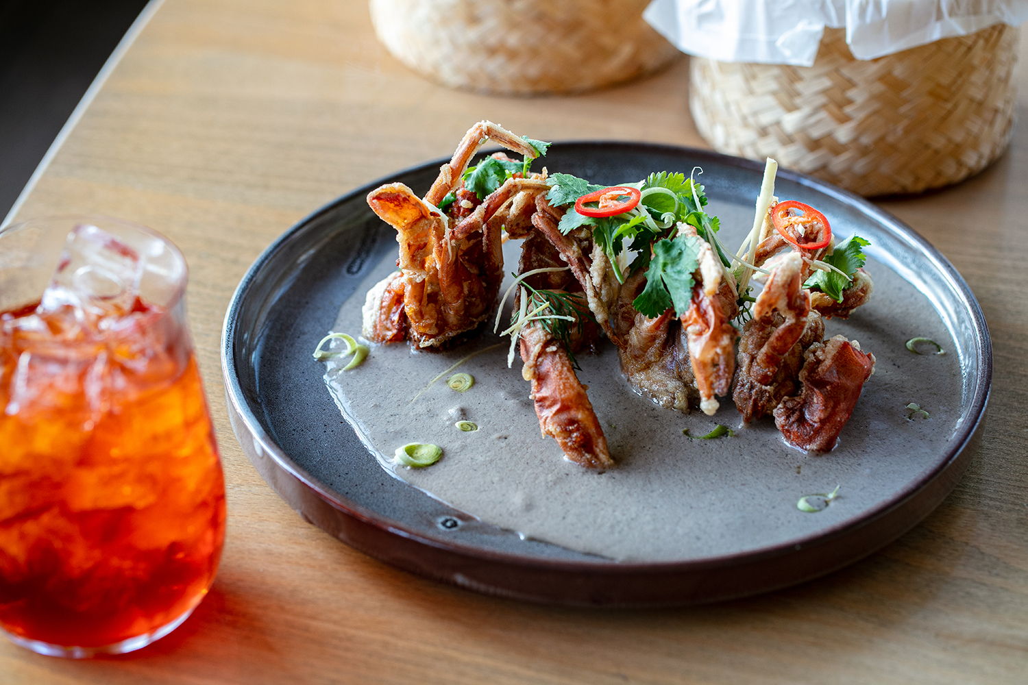 The soft-shell crab with coconut sauce and coriander. Photo / Babiche Martens