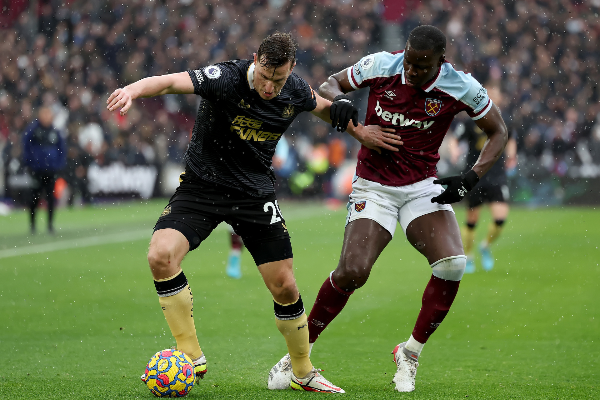 Chris Wood of Newcastle United under pressure from Kurt Zouma of West Ham United. Photo / Photosport.co.nz