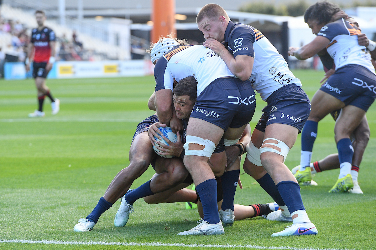 David Havili of the Crusaders scores a try in the tackle of Rory Scott of the Brumbies. Photo / Photosport