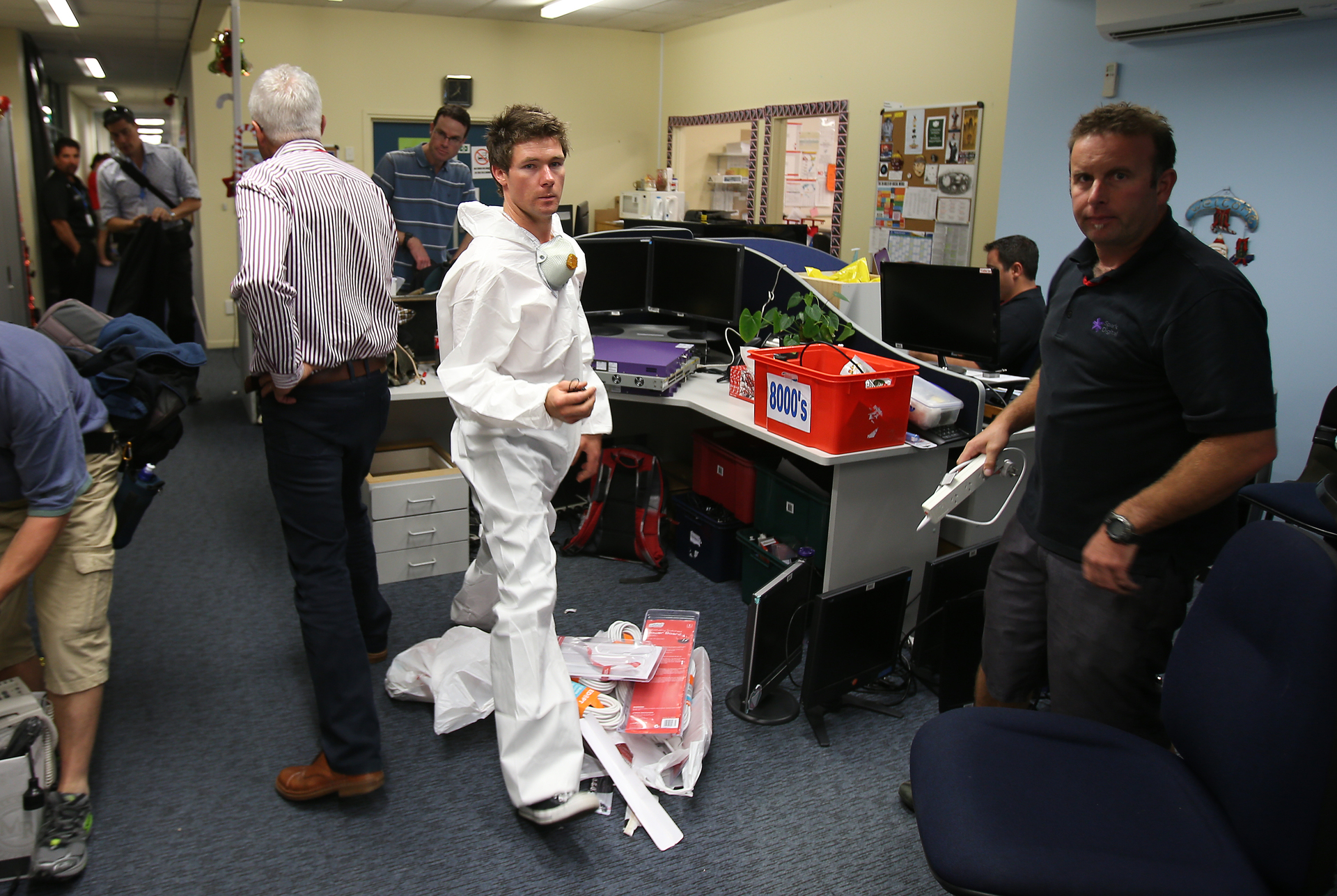 Staff and people testing for black mould, pictured mid-evacuation. Photo / NZME