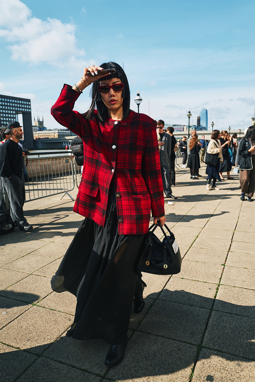 A plaid jacket on a street in London. Photo / Simbarashe Cha for The New York Times