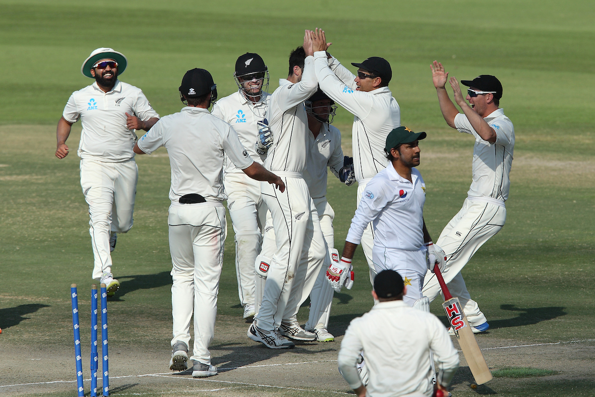 The Black Caps celebrate the vital wicket of Sarfraz Ahmed. Photo / Photosport