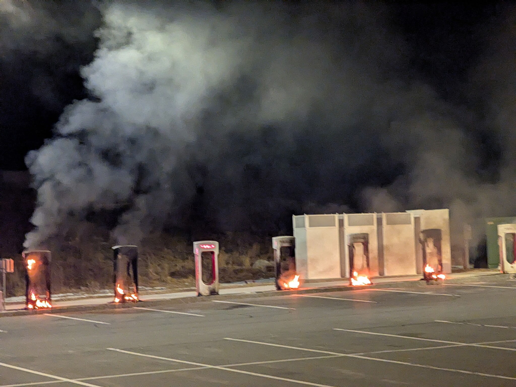 Tesla superchargers on fire in Littleton, Massachusetts. Photo / Fire Chief Steele McCurdy / Littleton Fire Department