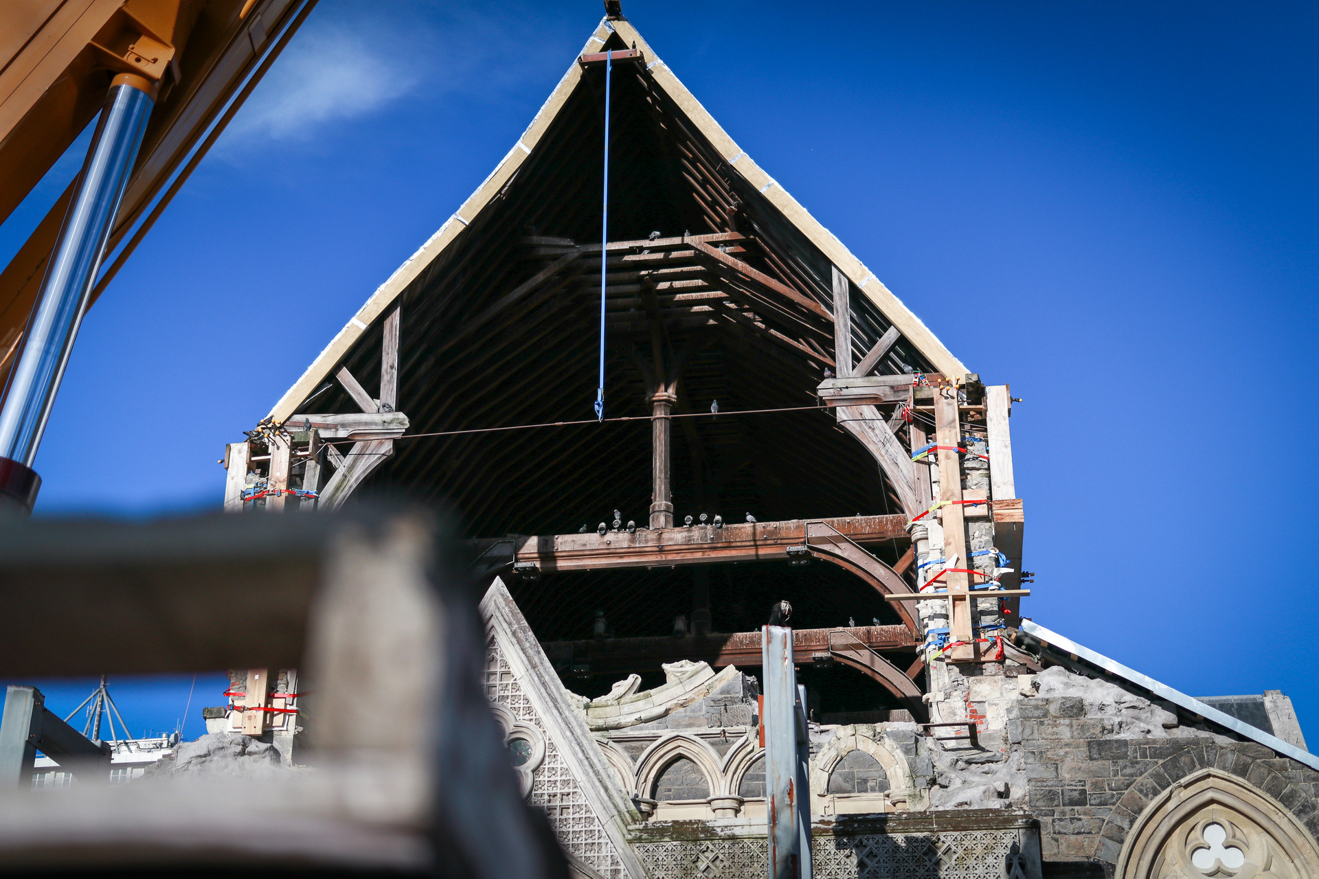 The missing west wall was originally home to the large rose window - now it is home to pigeons. Photo / Logan Church