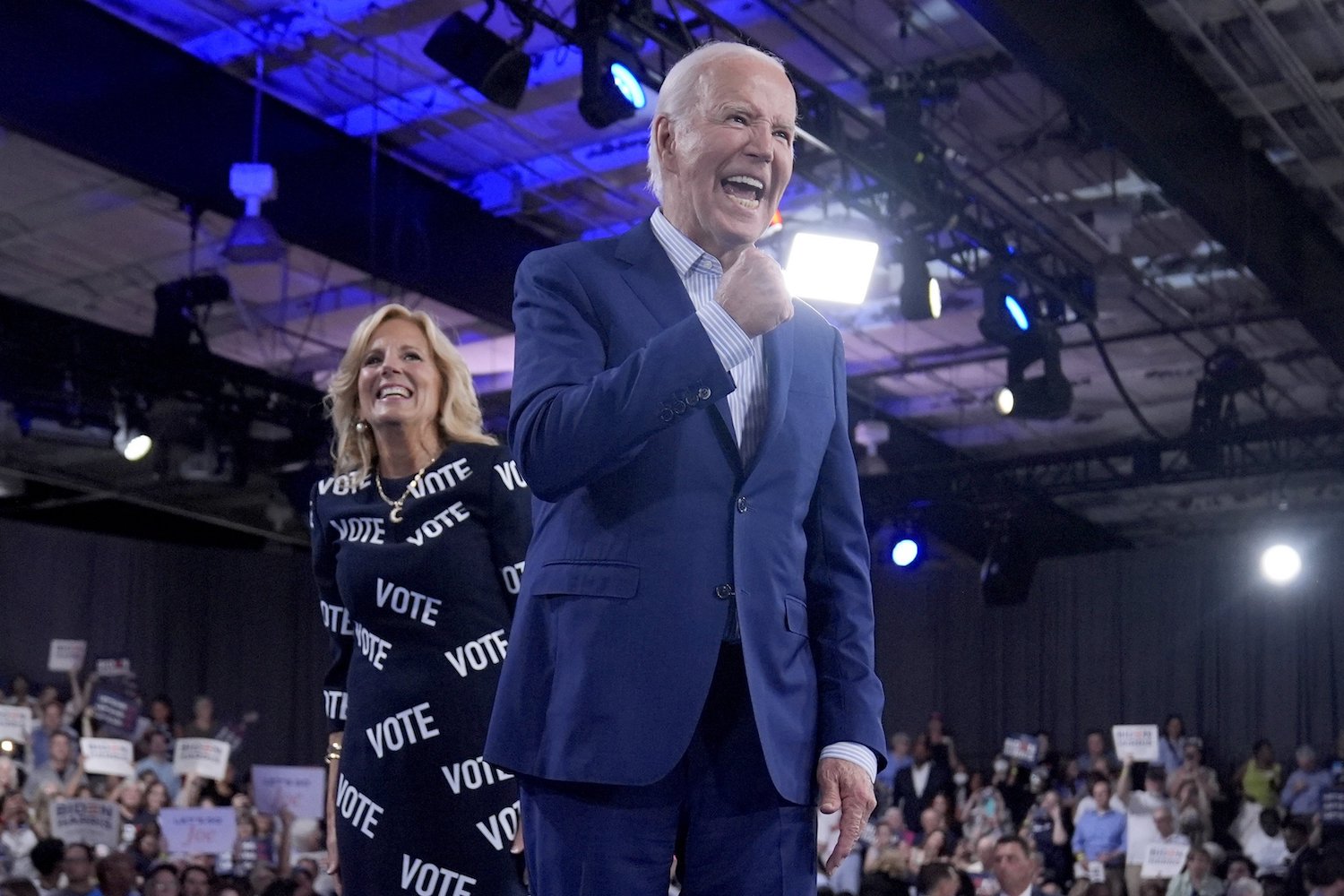 US President Joe Biden (right) and First Lady Jill Biden walk off stage after speaking at a campaign rally following the debate in Raleigh, North Carolina. Photo / AP