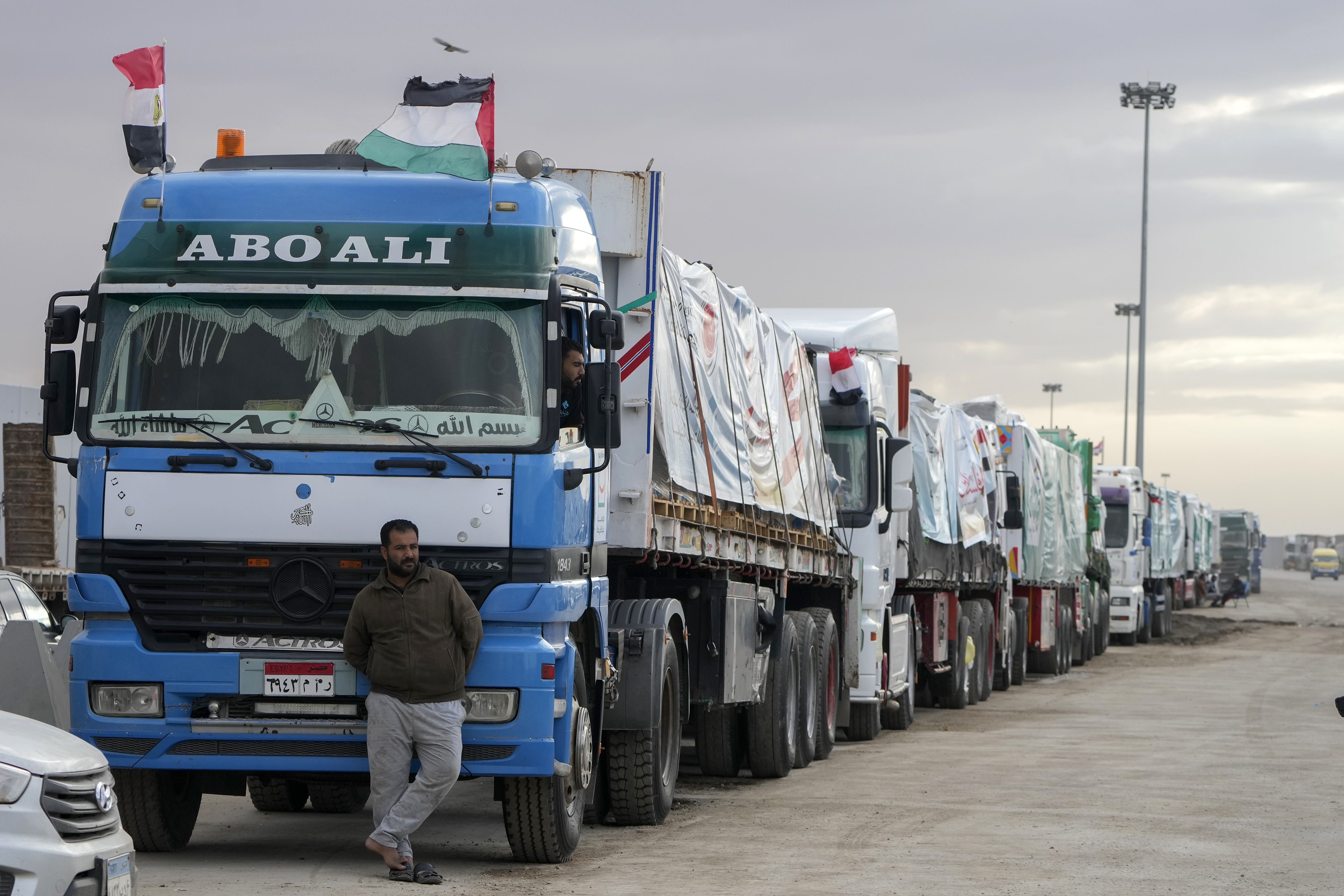 Trucks carrying humanitarian aid line up at the Rafah border crossing, Egypt, on the way to Gaza. Photo / AP