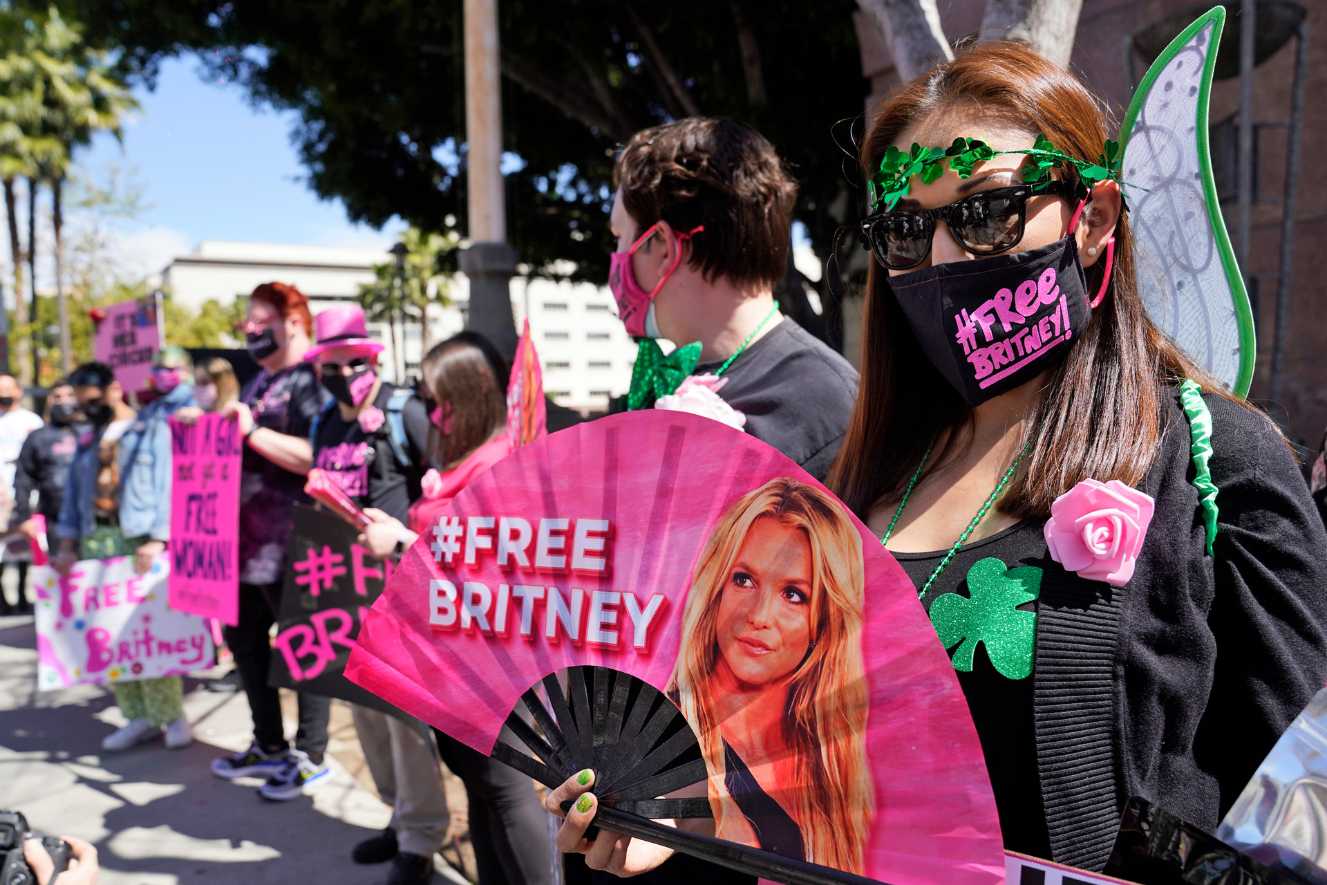 Britney Spears supporter holds a hand fan outside a court hearing concerning the pop singer's conservatorship at the Stanley Mosk Courthouse in March, 2021. Photo / AP