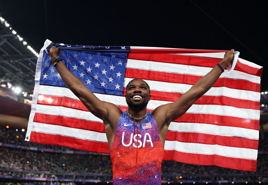 PARIS, FRANCE - AUGUST 04: Noah Lyles of Team United States celebrates winning the gold medal after competing the Men's 100m Final on day nine of the Olympic Games Paris 2024 at Stade de France on August 04, 2024 in Paris, France. (Photo by Christian Petersen/Getty Images)