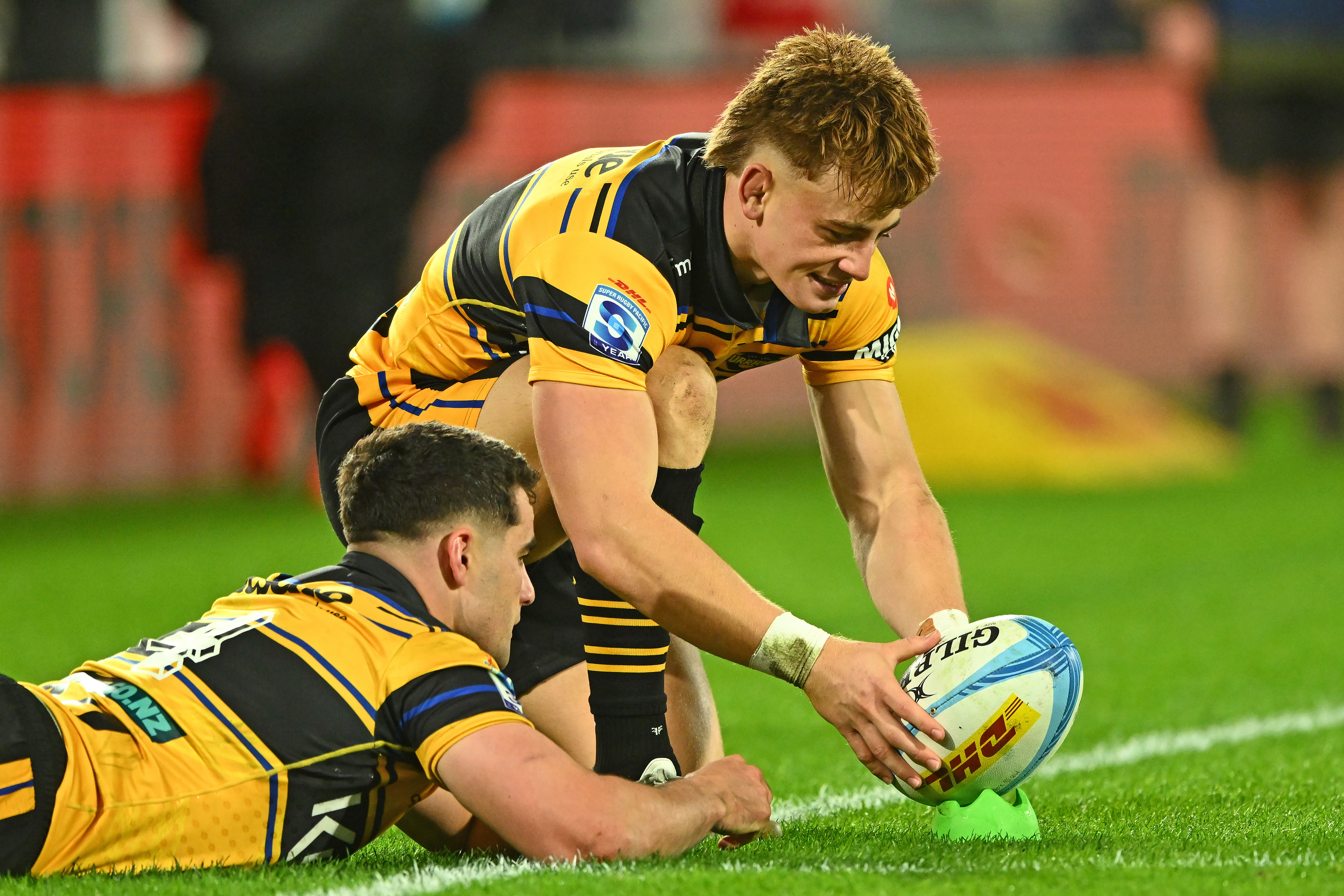 Josh Moorby held the ball on the tee prior to Ruben Love's conversions. Photo / Photosport