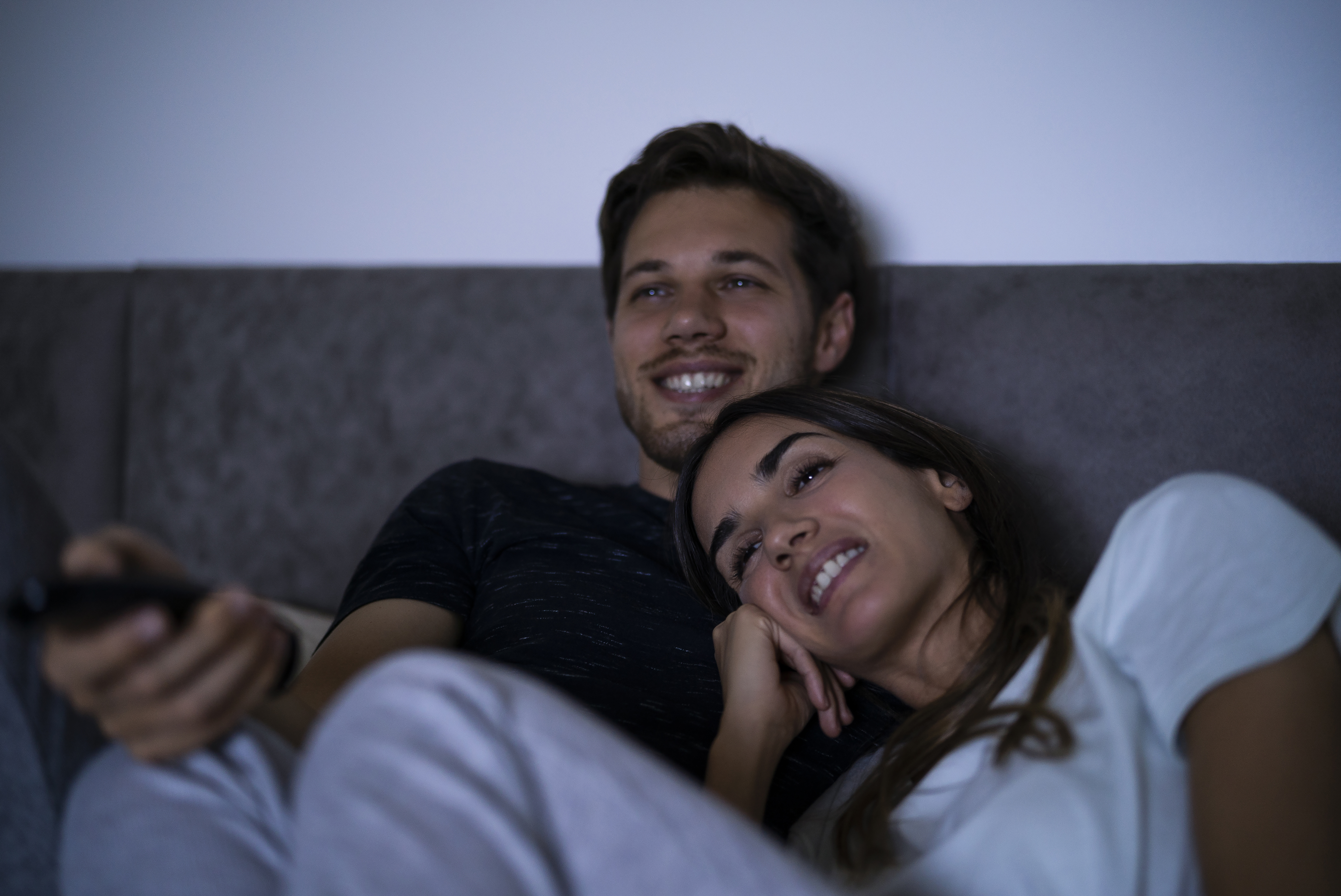 Avoid watching TV in your bedroom for as long as you can. Or if that's not possible, try sitting in a different position while in there before you go to sleep. Photo / Getty Images