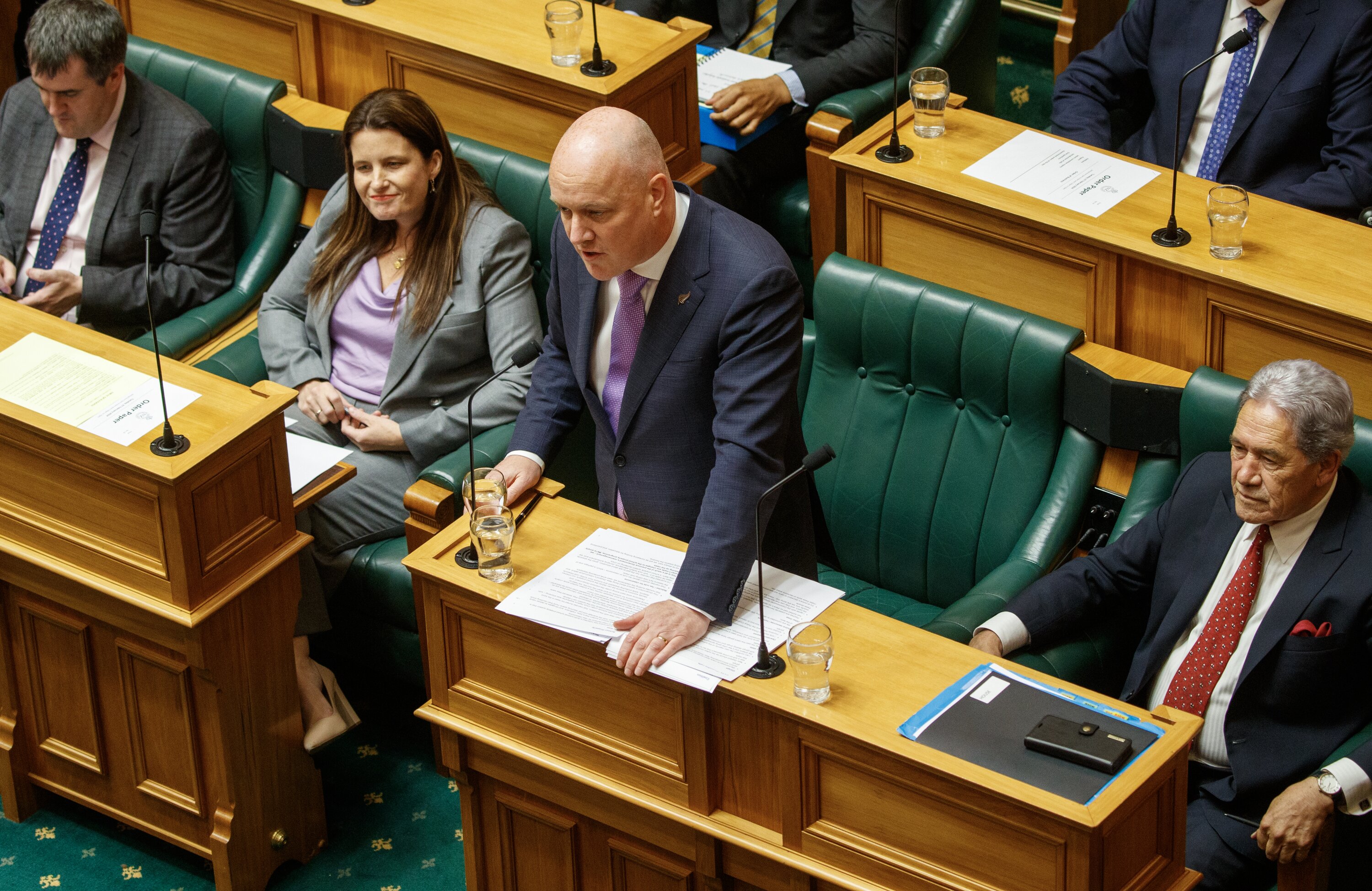 The coalition, which includes Finance Minister Nicola Willis, Prime Minister Christopher Luxon and NZ First leader Winston Peters, is preparing to scrap the fees-free university scheme. Photo / Mark Mitchell