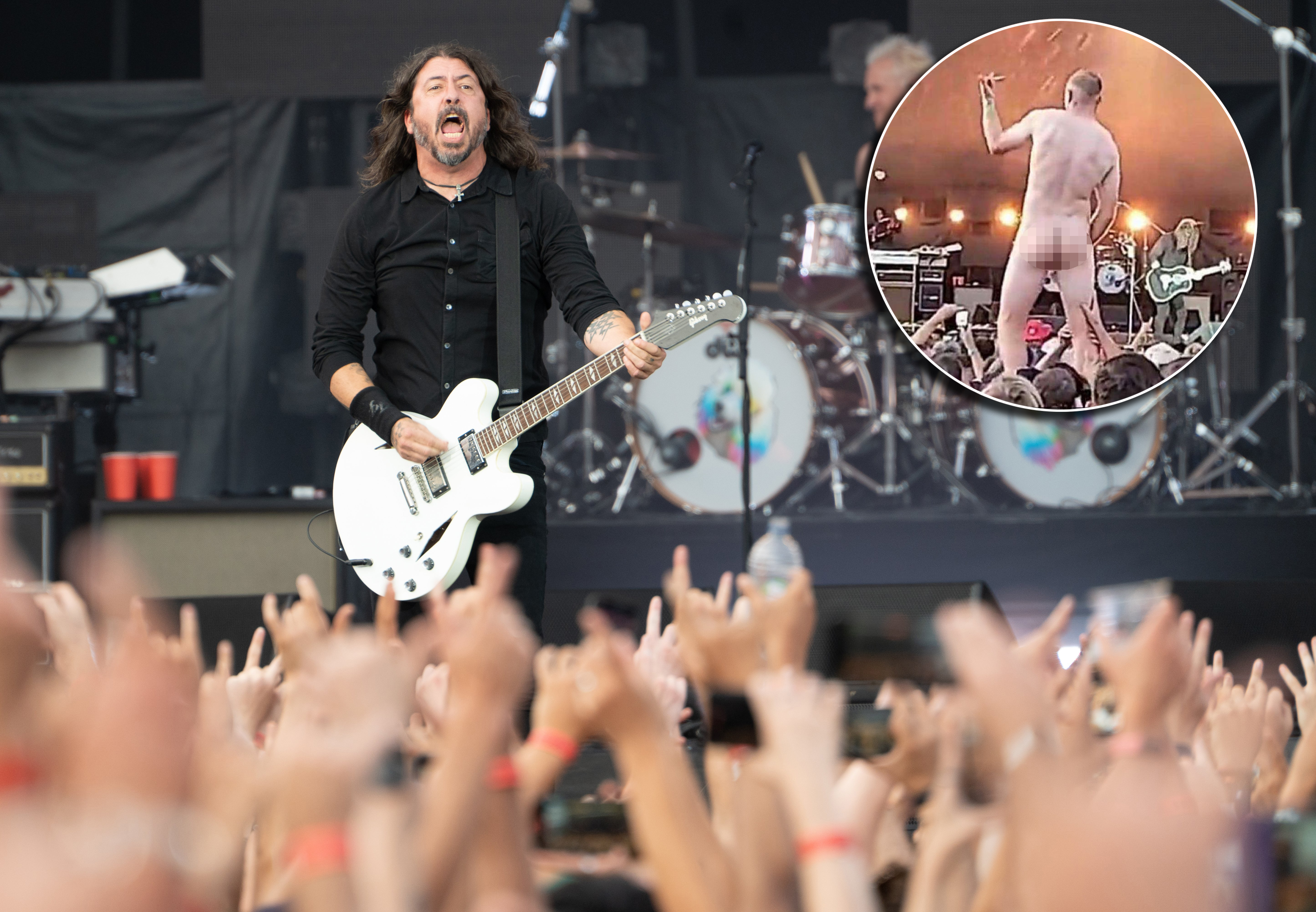 As the Foo Fighters performed in Christchurch, a man stripped fully nude.