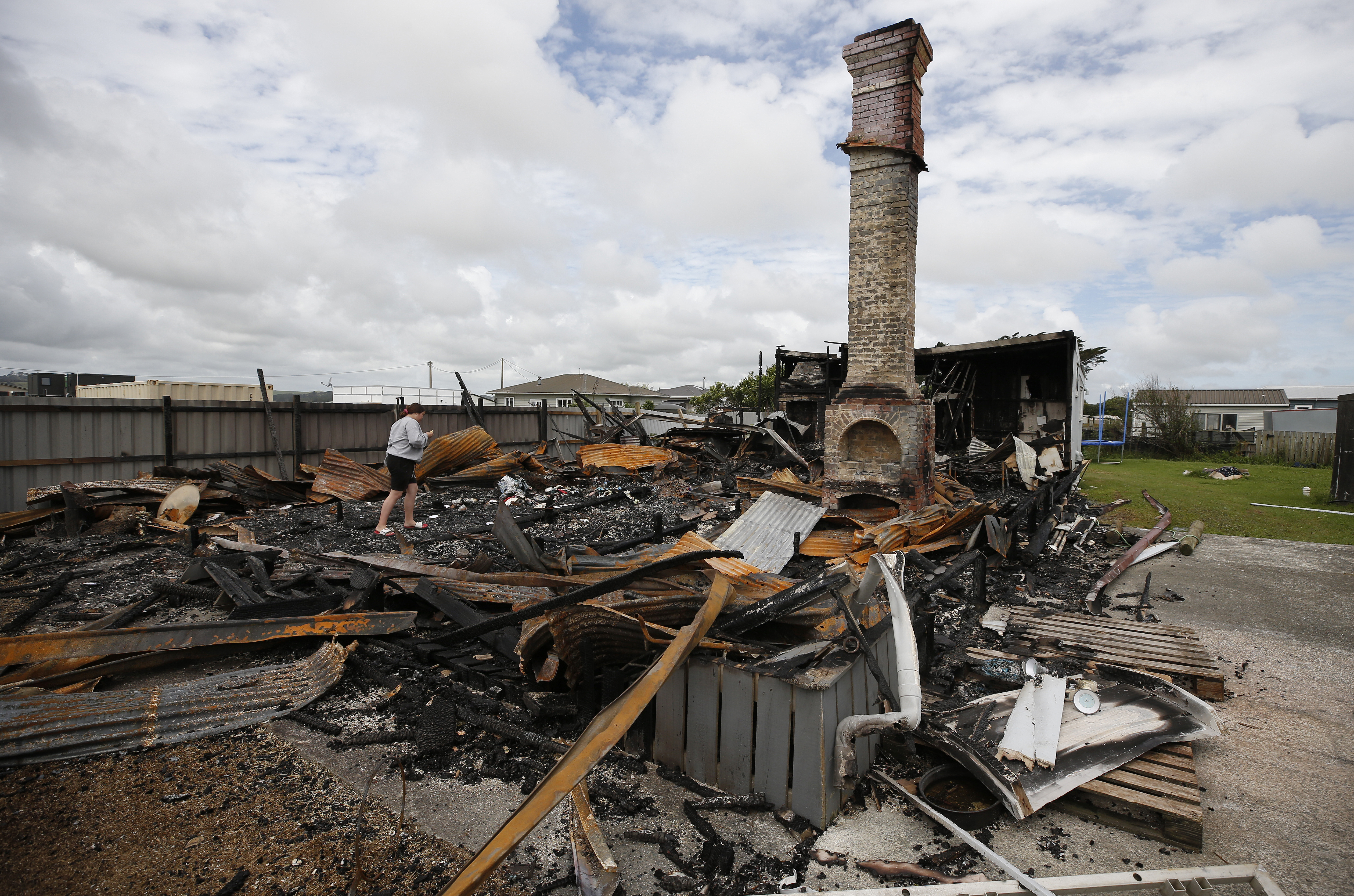 The belongings of Shakaya Kira and her family have been reduced to ash. Photo / Michael Cunningham
