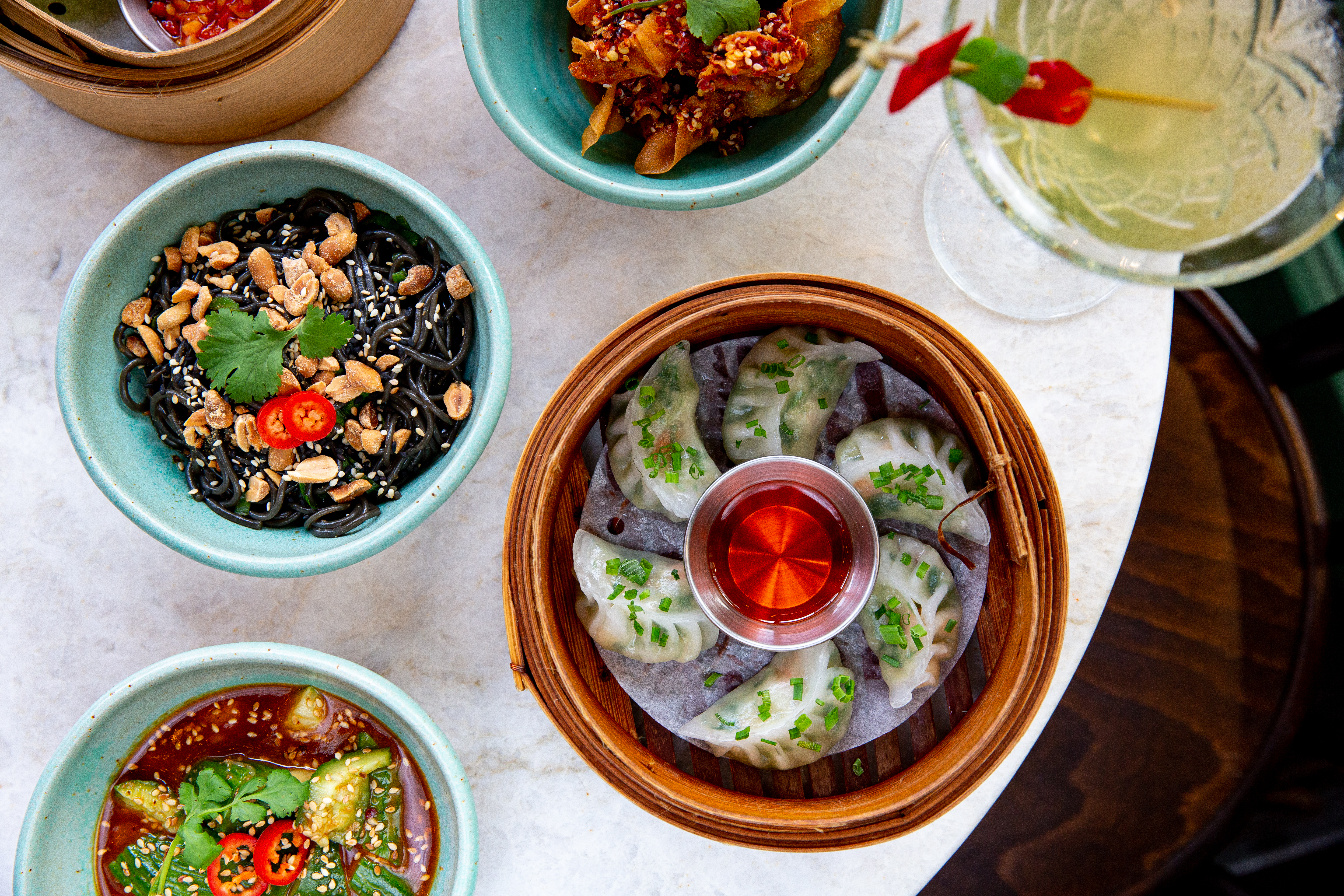 The steamed dumplings, pork fried dumplings, cucumber salad, spring rolls and noodle salad. Photo / Babiche Martens