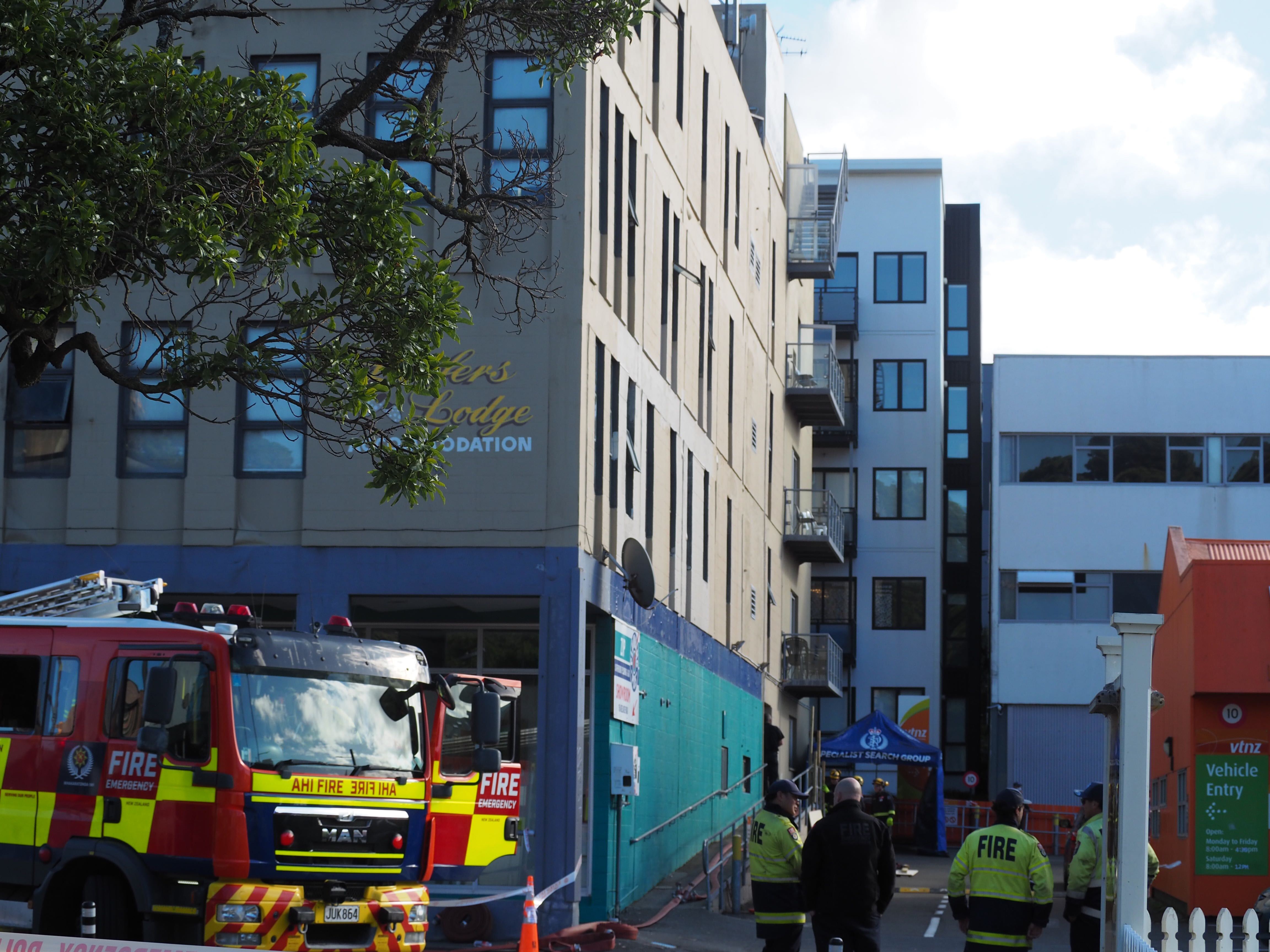 Police and emergency services on the scene at the Loafers Lodge hostel fire in Wellington. May 17, 2023. Photo / Nick James