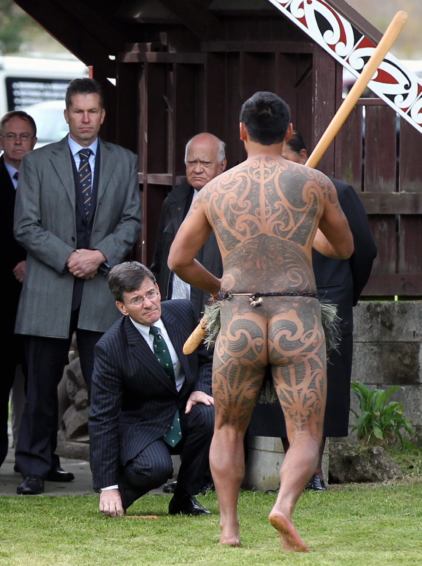 Chris Finlayson accepts the wero issued by Rangitane Taurima at Tangoio Marae for the Maungaharuru Tangitu Treaty settlement signing. Photo / Duncan Brown