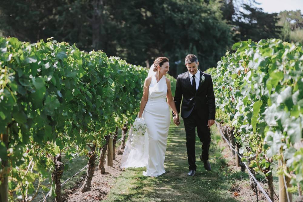 Dame Jacinda Ardern and Clarke Gayford pictured at their wedding. Photo / Felicity Jean Photography