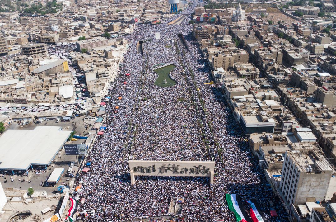 Iraqis hold a mass rally supporting the Palestinians in the Gaza Strip on Friday, Oct. 13, 2023., in Baghdad, Iraq. (AP Photo/Anmar Khalil)