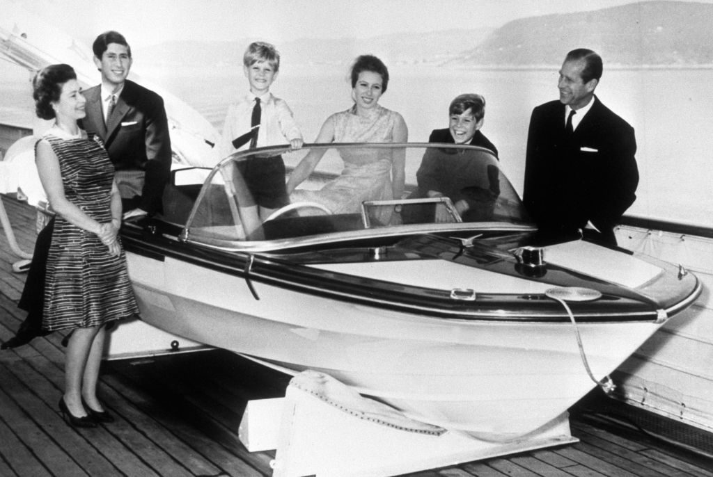 Queen Elizabeth II, the Prince of Wales, Prince Edward, Princess Anne, Prince Andrew and the Duke of Edinburgh on board the Royal Yacht Britannia during a visit to Norway. It is the photograph used on the Queen's personal Christmas card. Photo / Getty Images