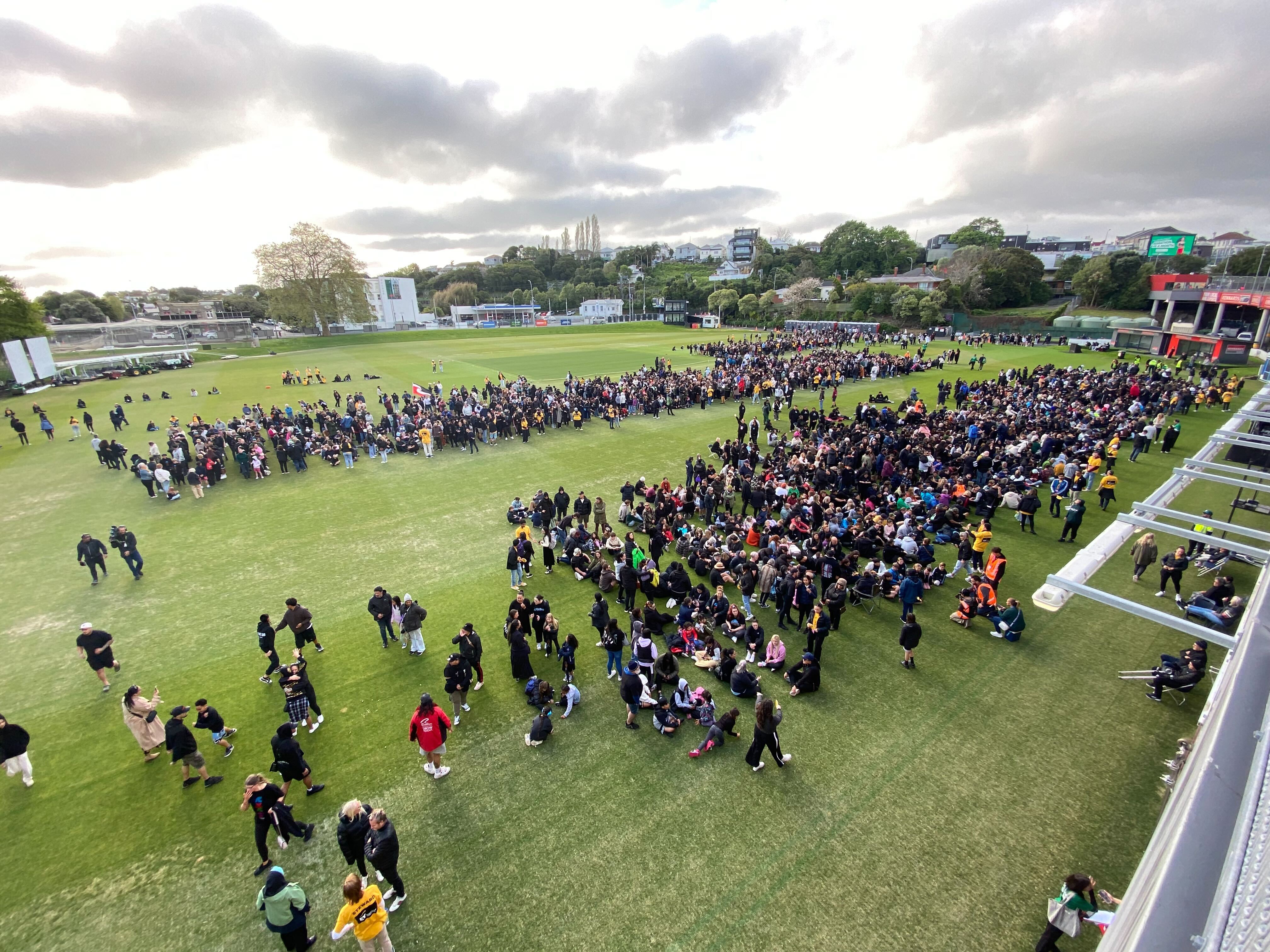 Haka participants filing onto the Eden Park outer oval. Photo /  Ben Plummer