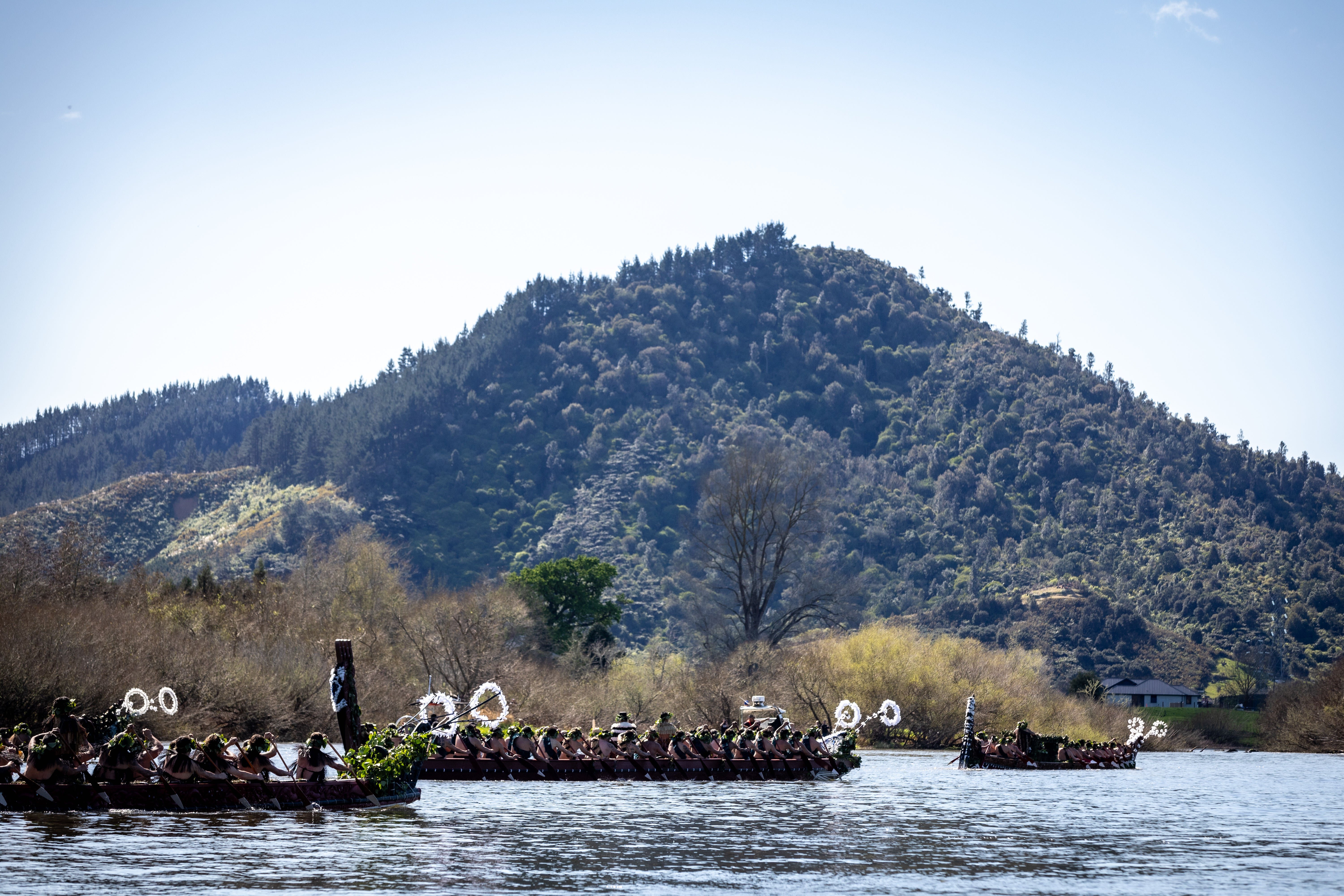 
Waka carry Kingi Tuheitia and mourners to Taupiri maunga for burial during his tangi on September 5 last year. Photo / Mike Scott