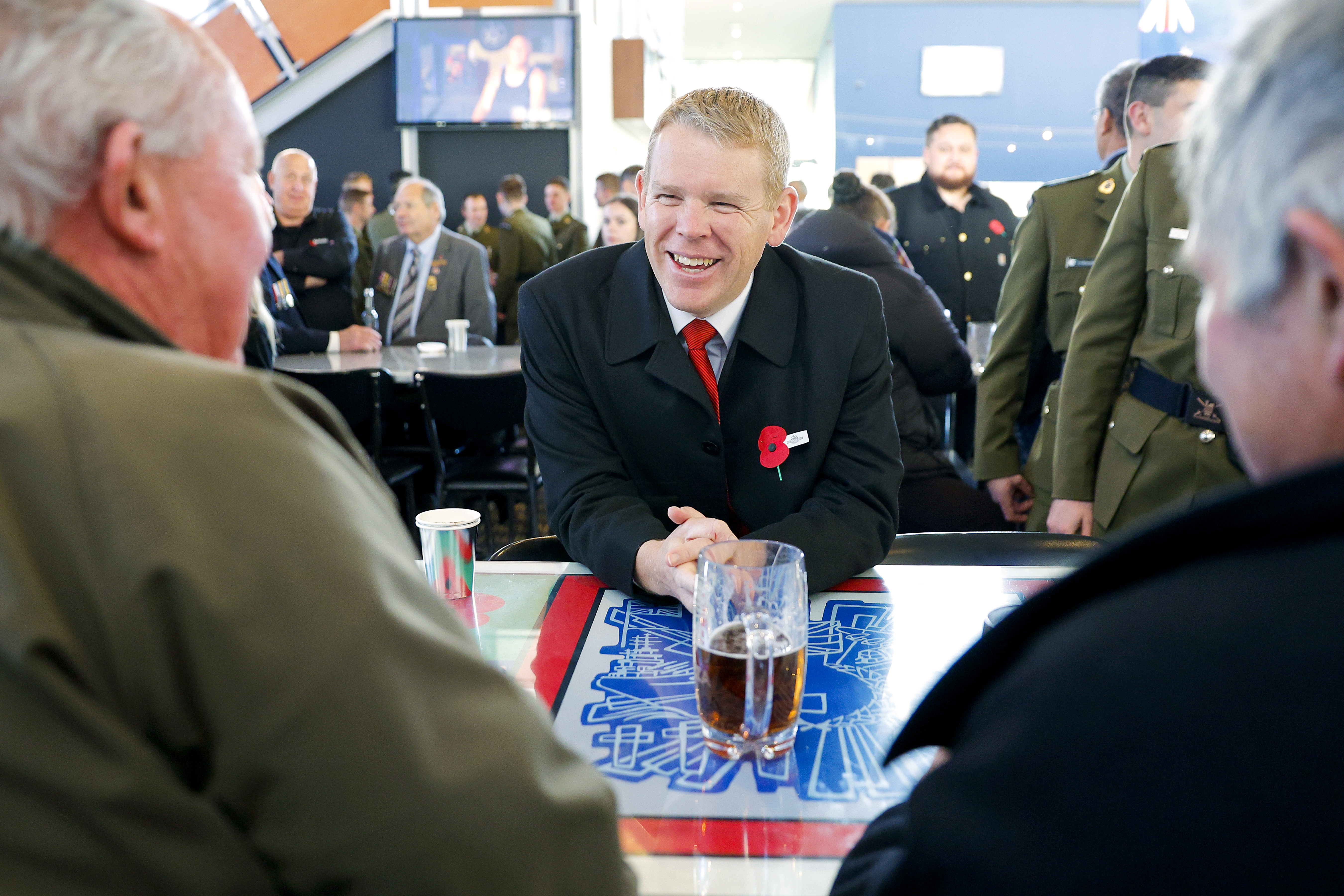 Prime Minister Chris Hipkins mingles at the Upper Hutt Cosmopolitan Club after attending dawn service on April 25, 2023. Photo / Getty Images