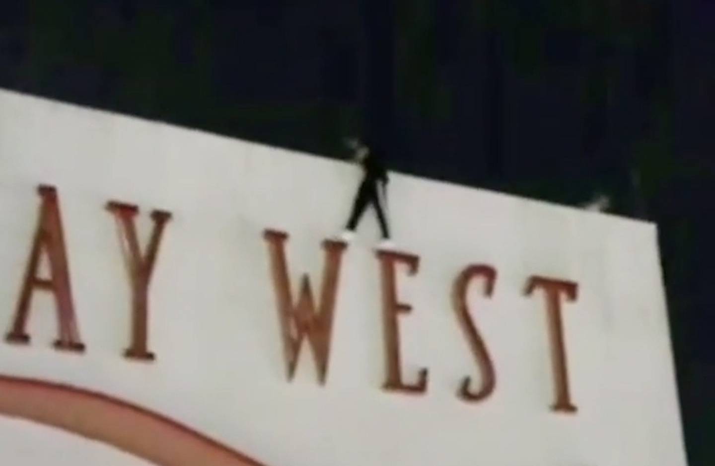 Video shows one of the young people stepping on the narrow letters of the Quay West signage. Photo / TikTok

