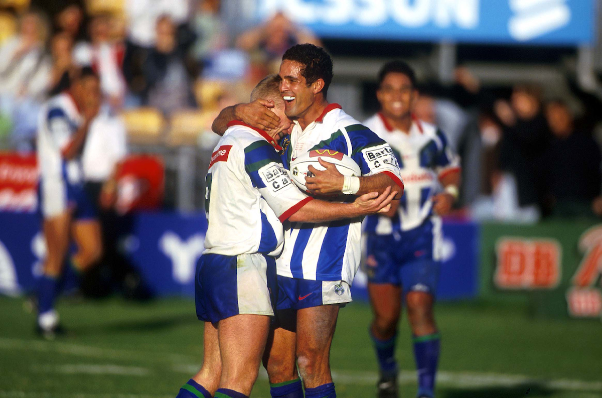 Warriors Matthew Ridge and Robbie Mears celebrate a 1999 win over Raiders. Photo / Photosport