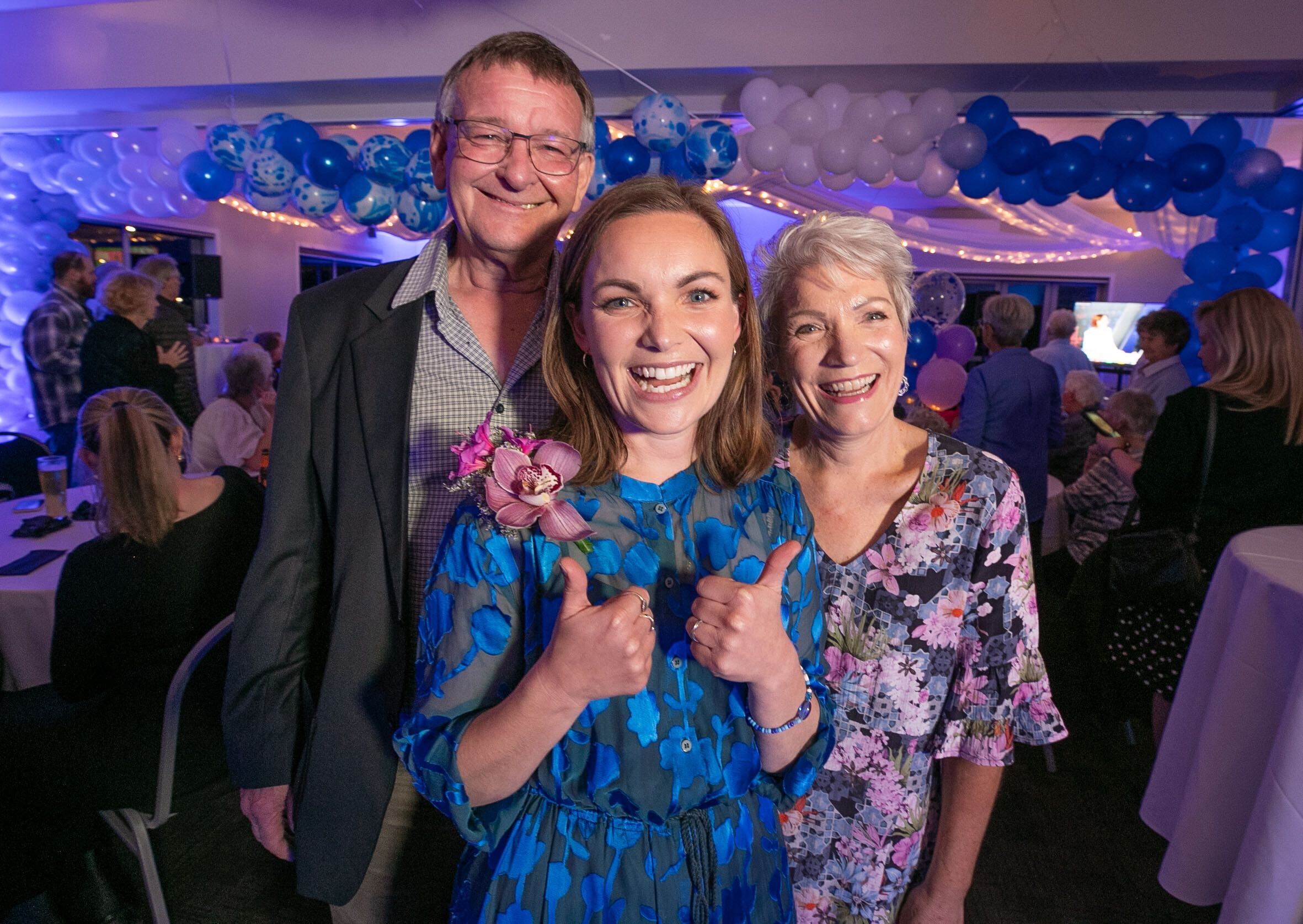 New Napier MP Katie Nimon with mum and dad Bill and Sue Nimon in Ahuriri on election night. Photo / Warren Buckland