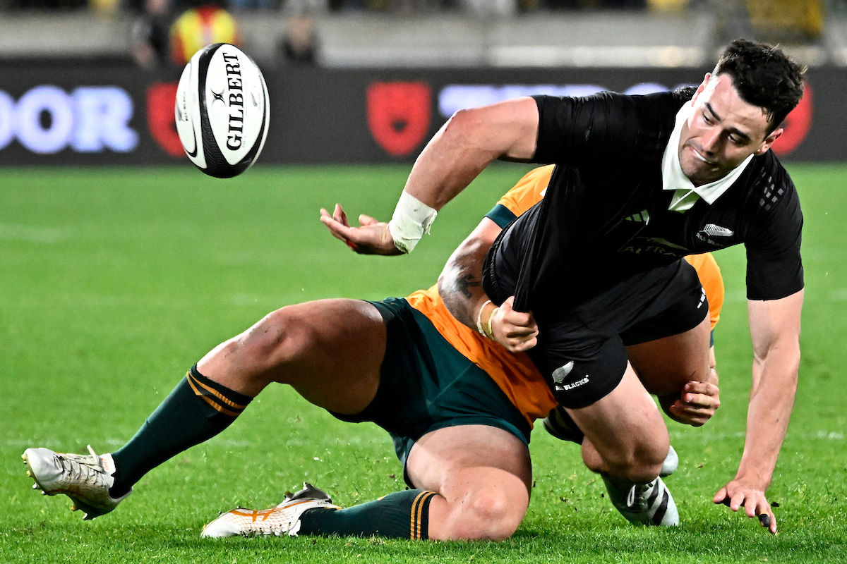 Will Jordan offloads against Australia. Photo / Photosport